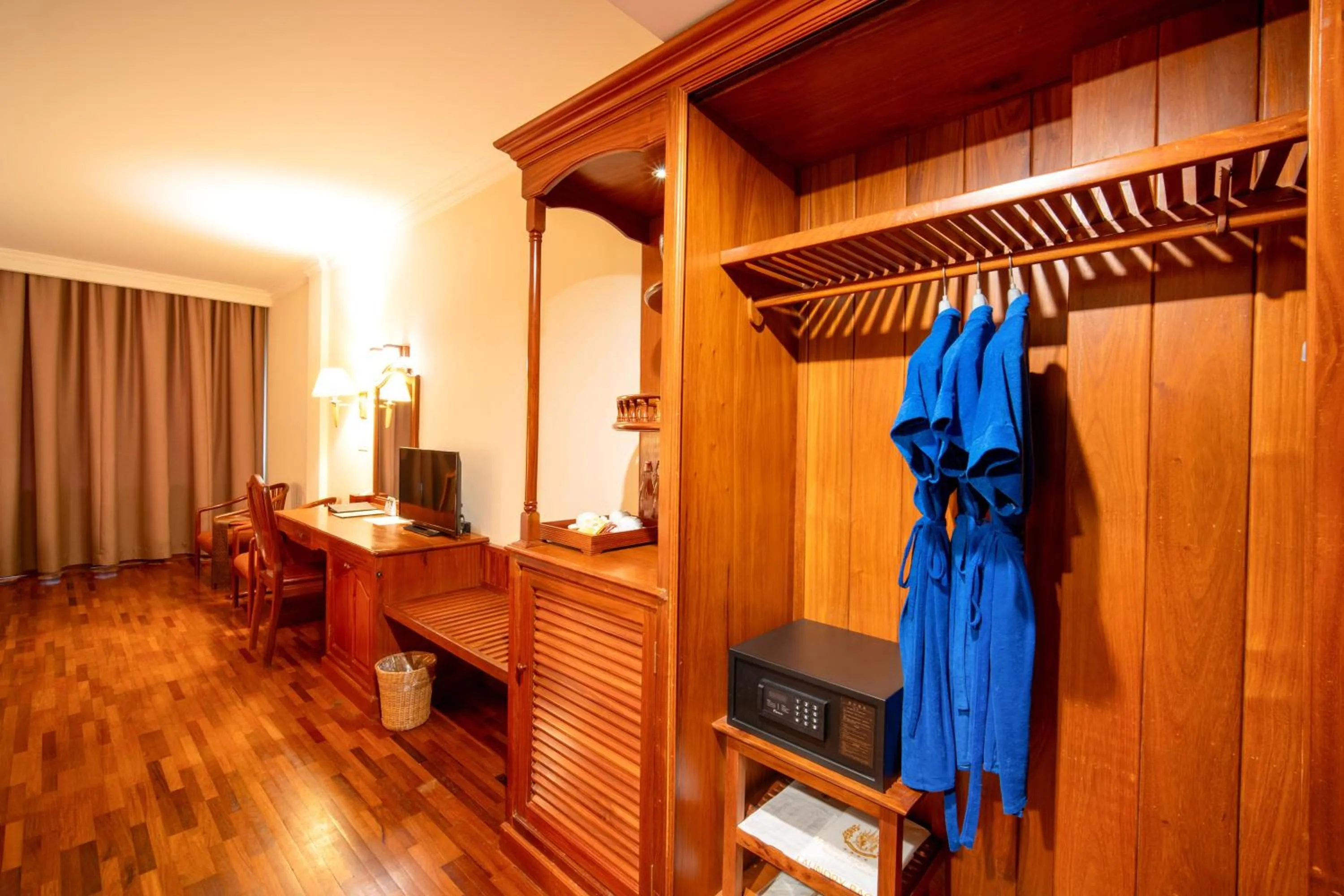 Bed in Khemara Angkor Hotel & Spa