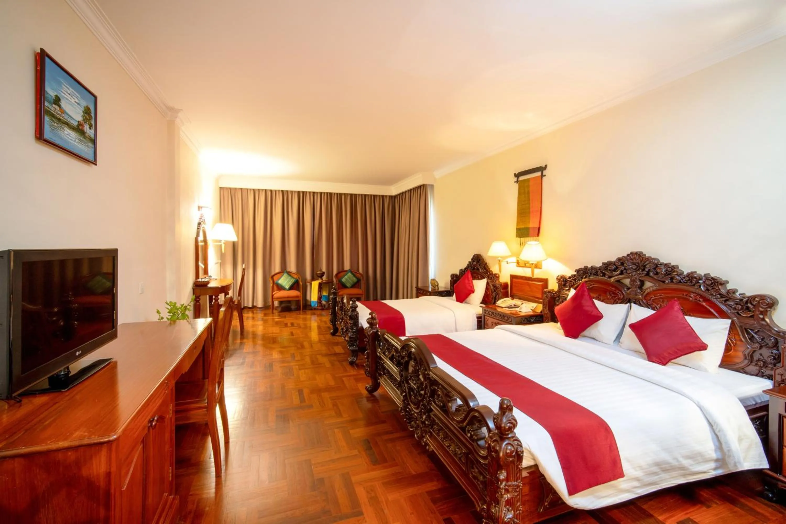 Communal lounge/ TV room, Bed in Khemara Angkor Hotel & Spa