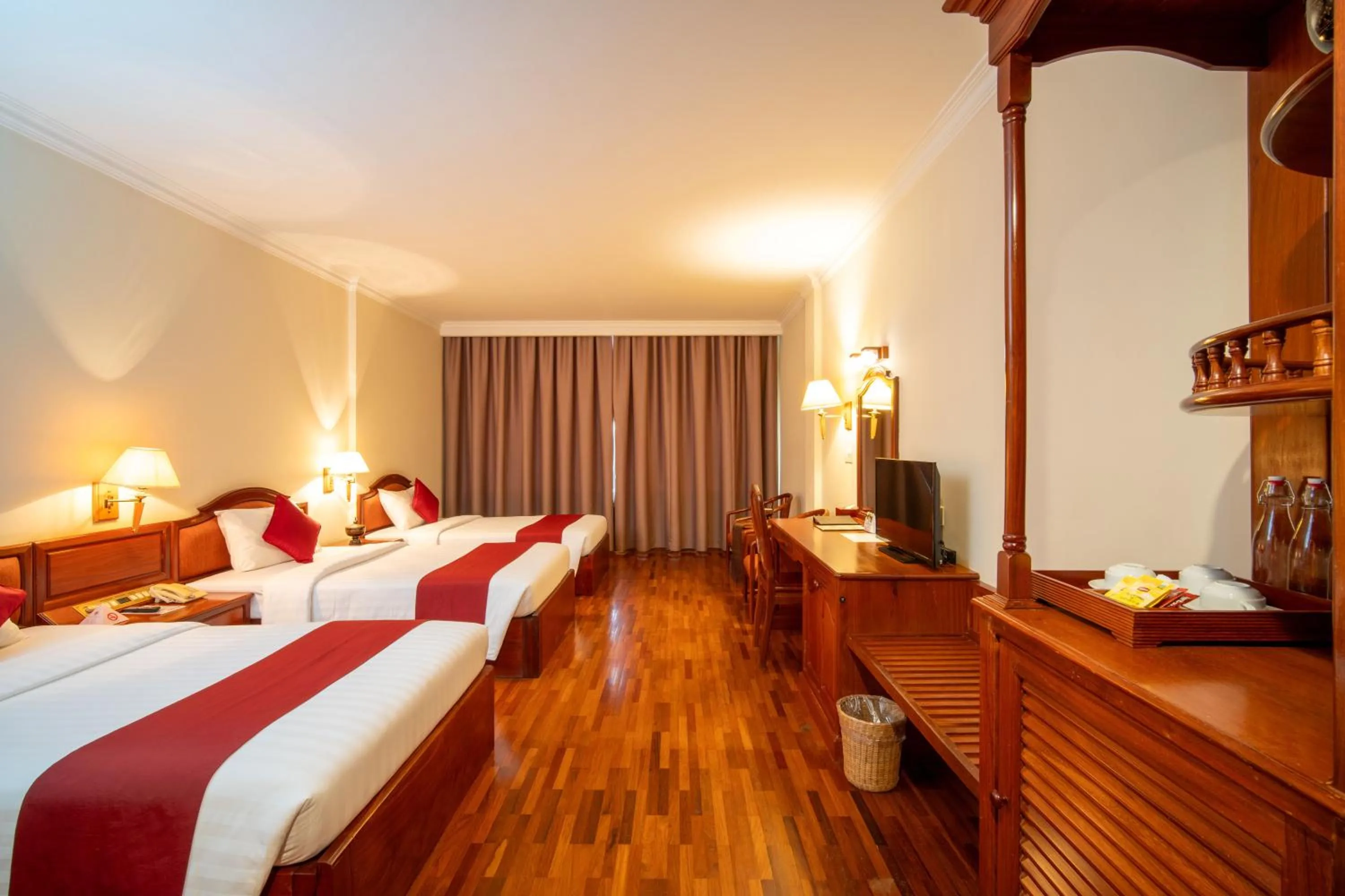 Bed in Khemara Angkor Hotel & Spa