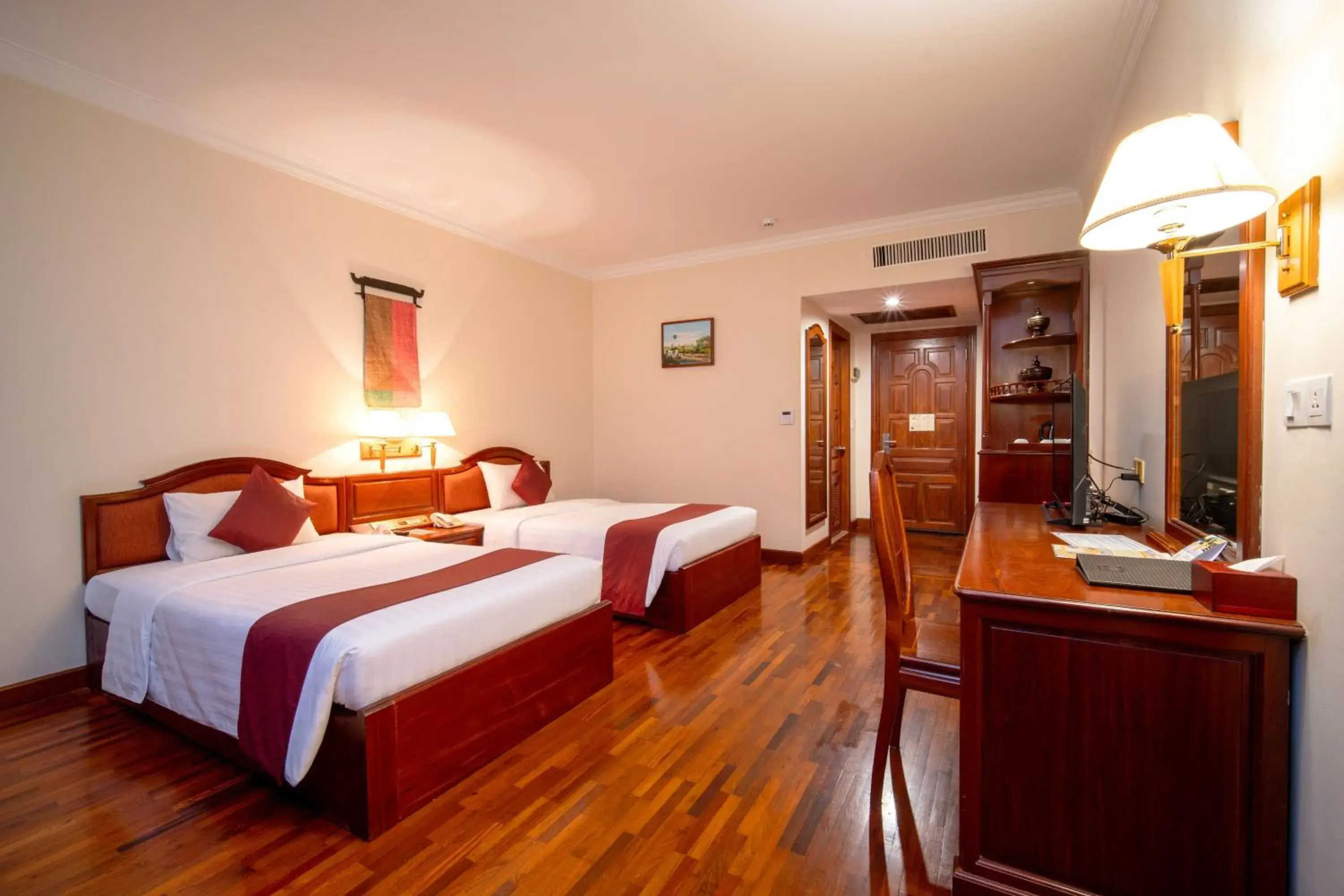 Bed in Khemara Angkor Hotel & Spa Bed in Khemara Angkor Hotel & Spa