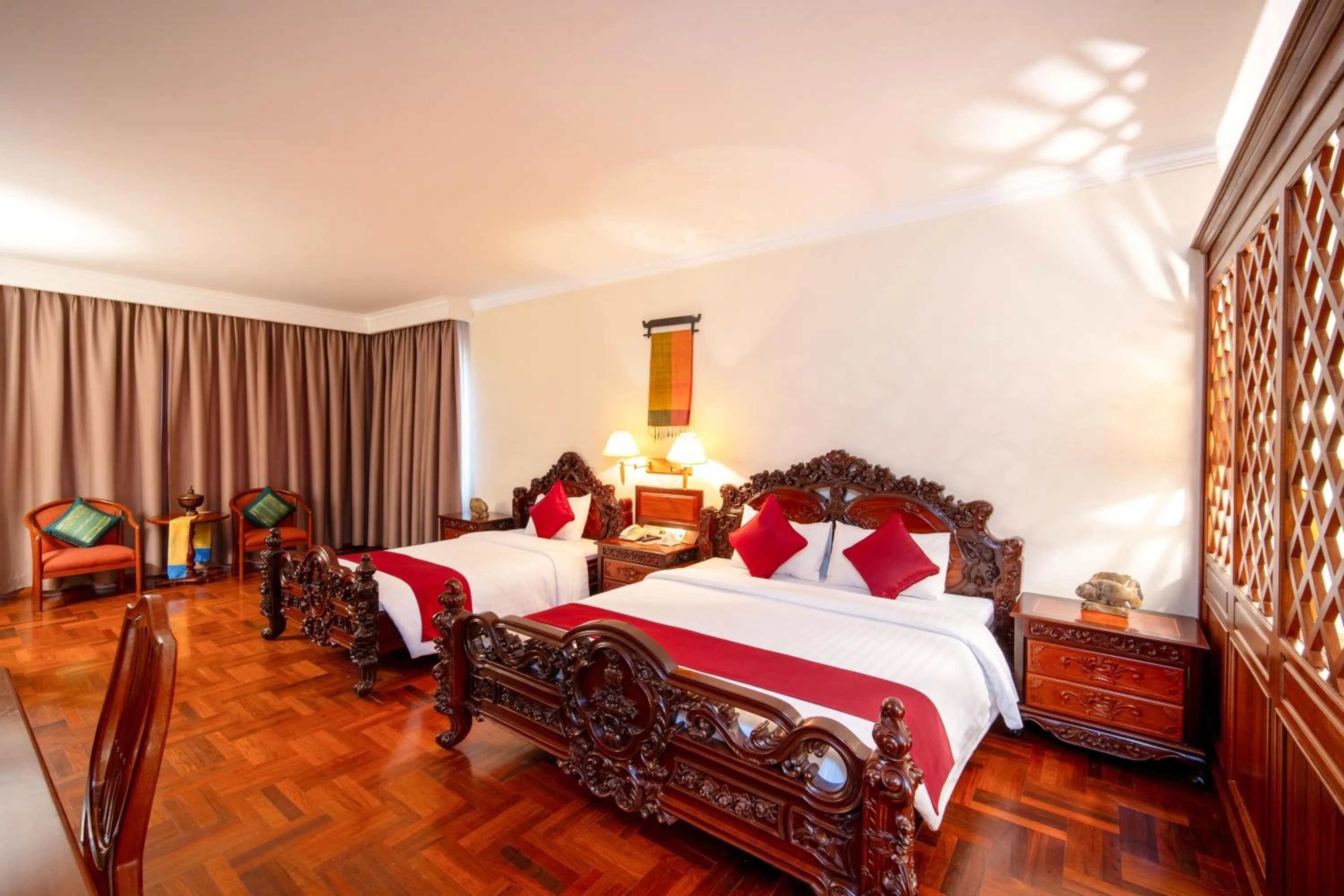 Bed in Khemara Angkor Hotel & Spa