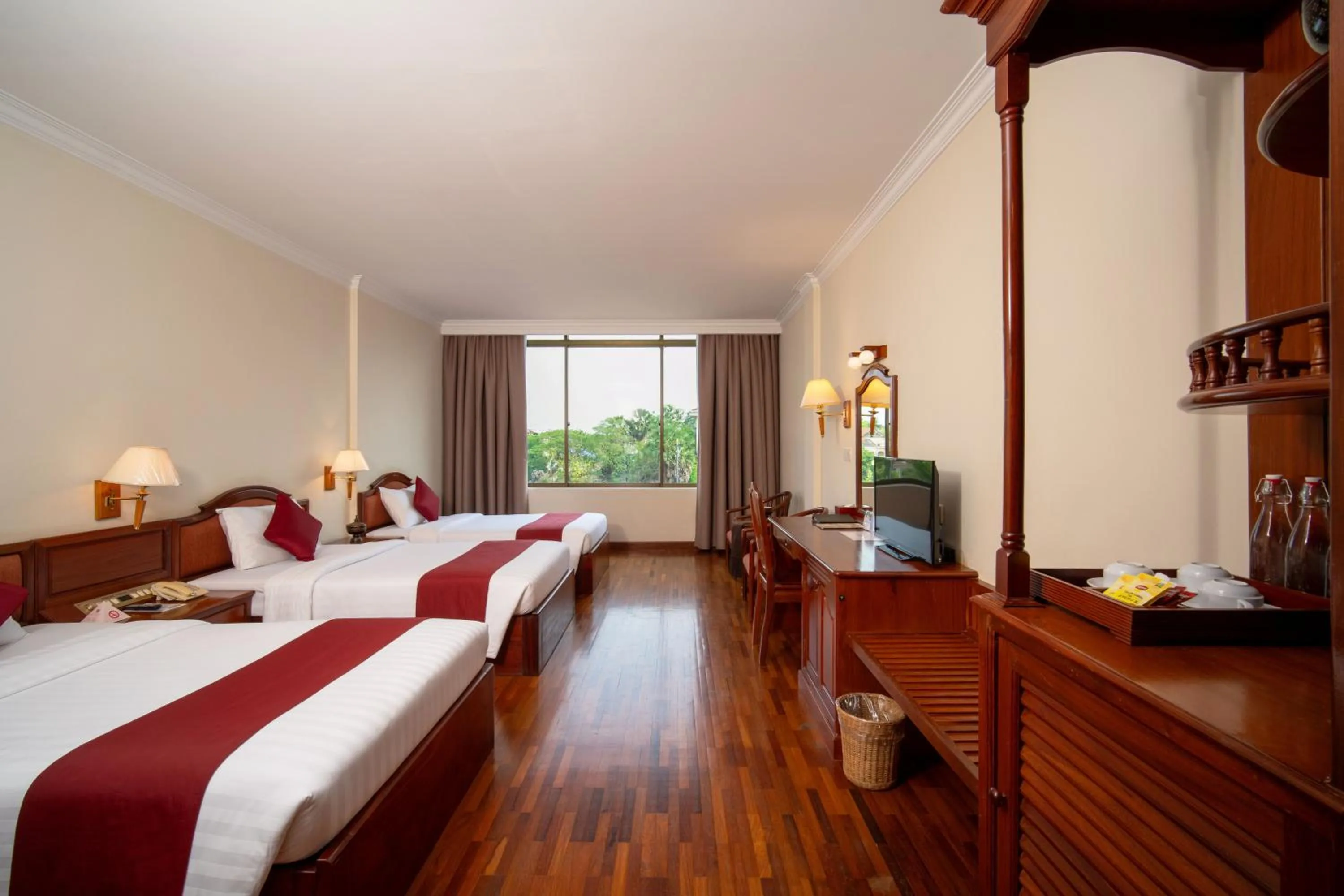 Bed in Khemara Angkor Hotel & Spa