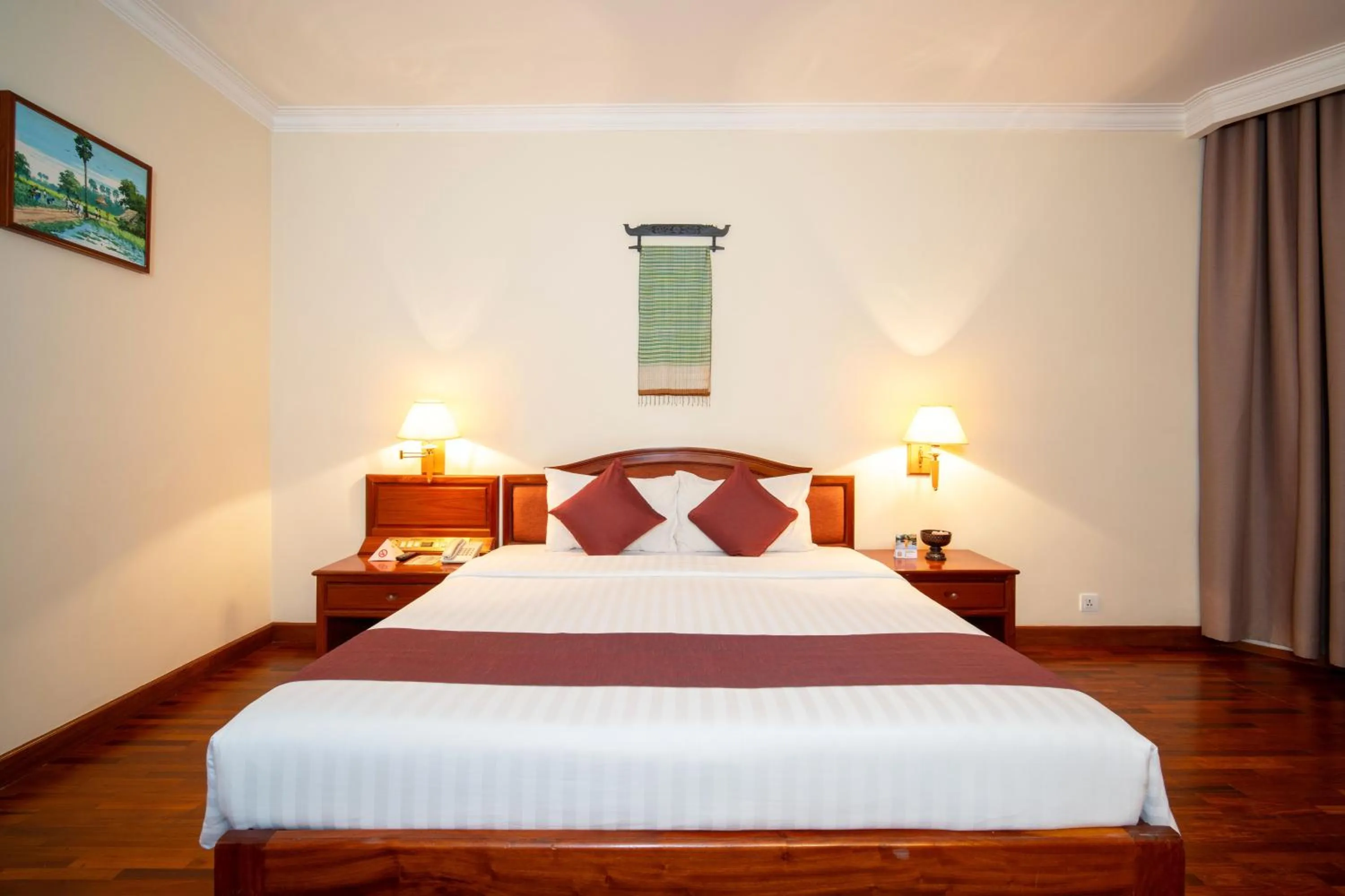 Bed in Khemara Angkor Hotel & Spa