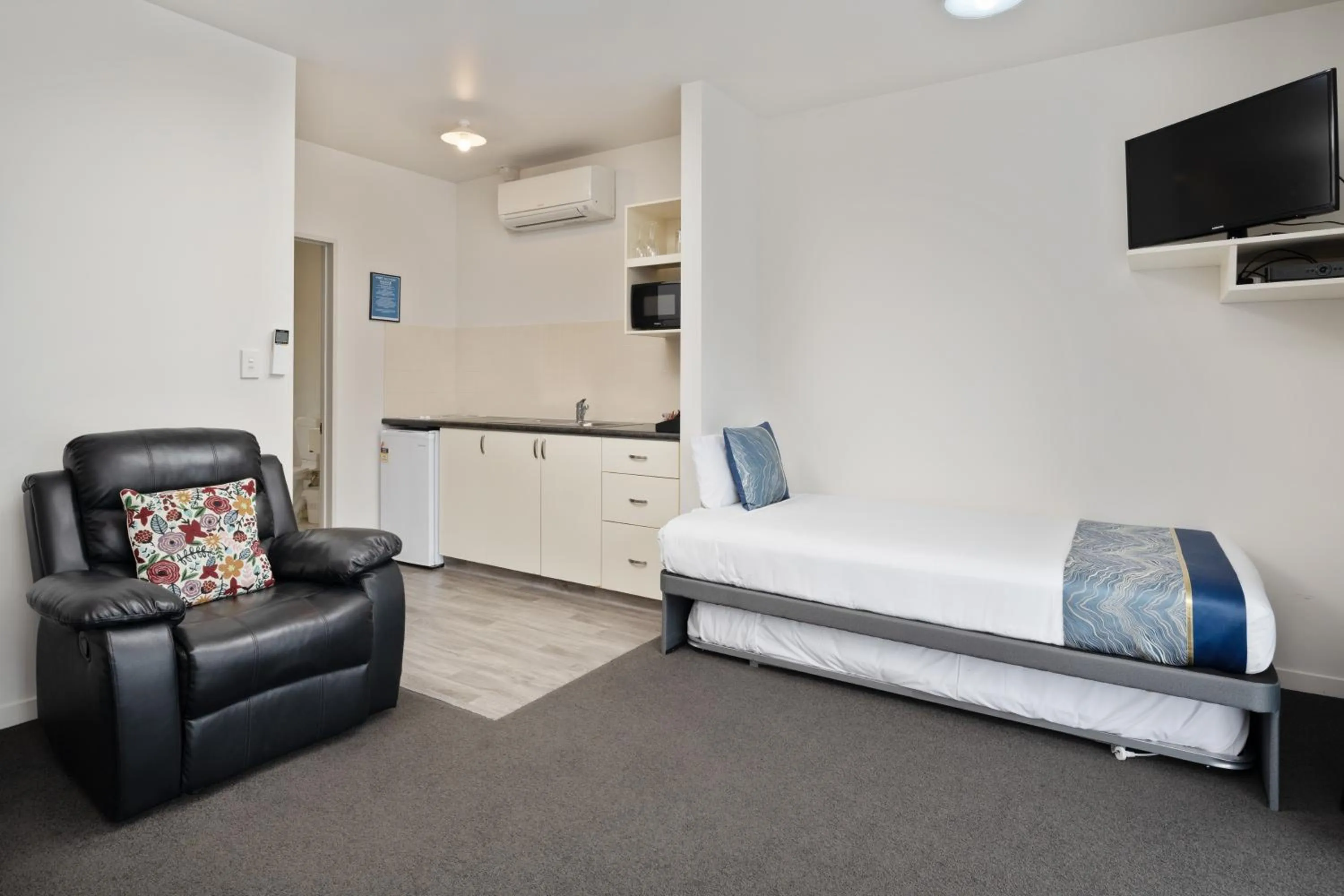 Bed in ASURE Phoenix Motor Inn