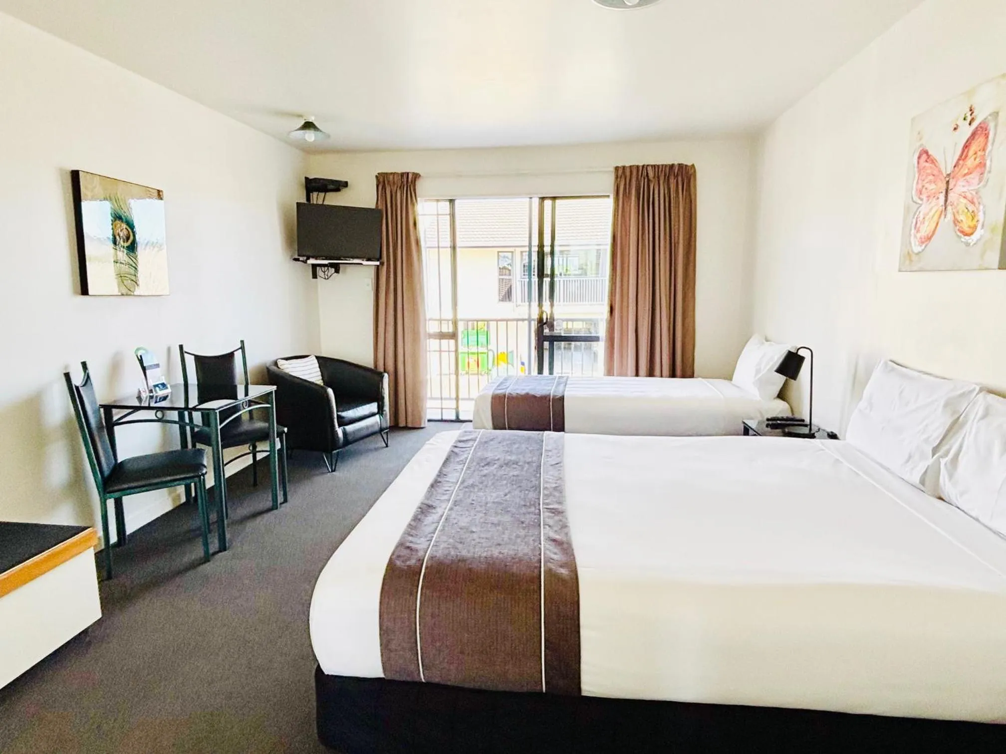 Bed in ASURE Phoenix Motor Inn