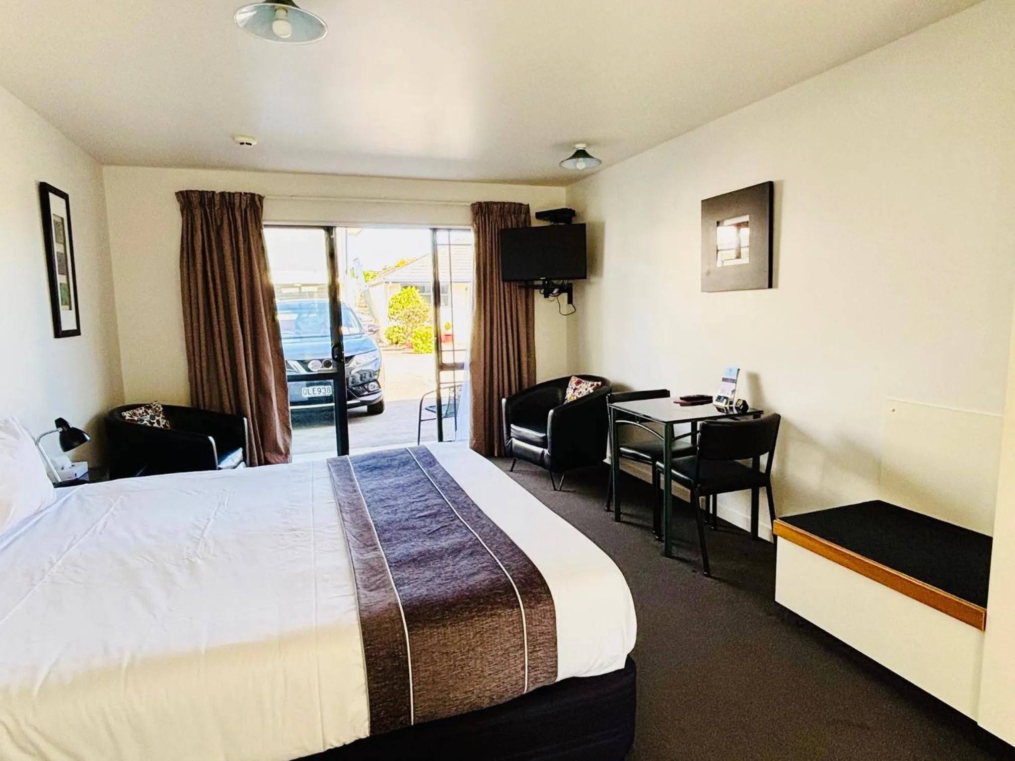 Bed in ASURE Phoenix Motor Inn