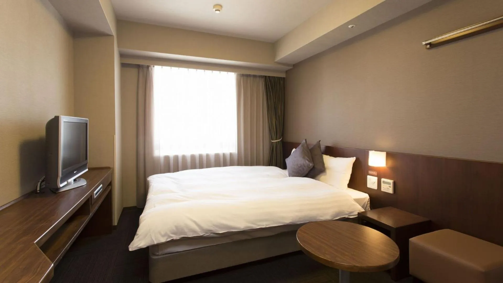 Bed in Dormy Inn Kumamoto Natural Hot Spring