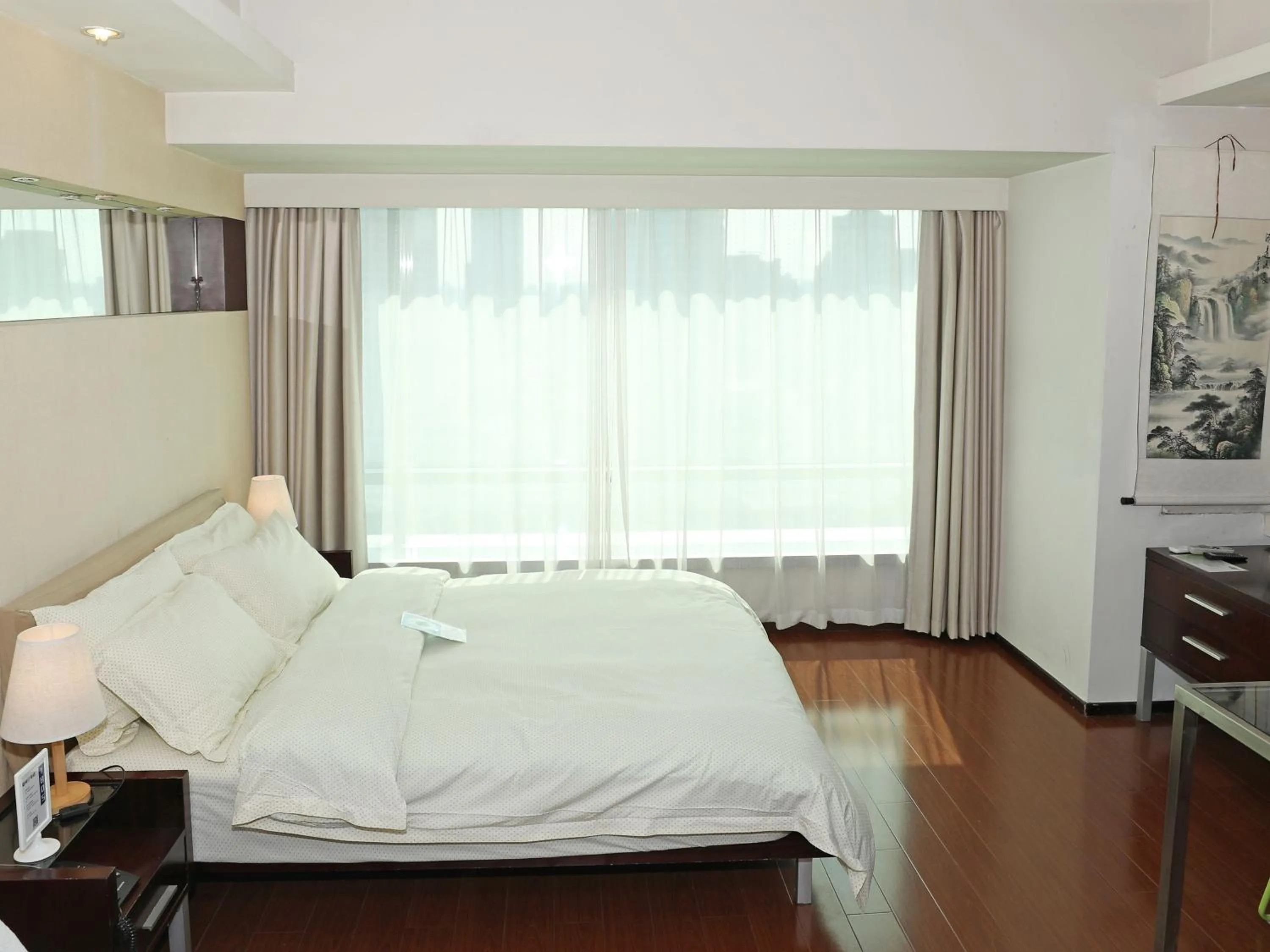 Bed in Shanghai Cosmo World Union Service Apartment