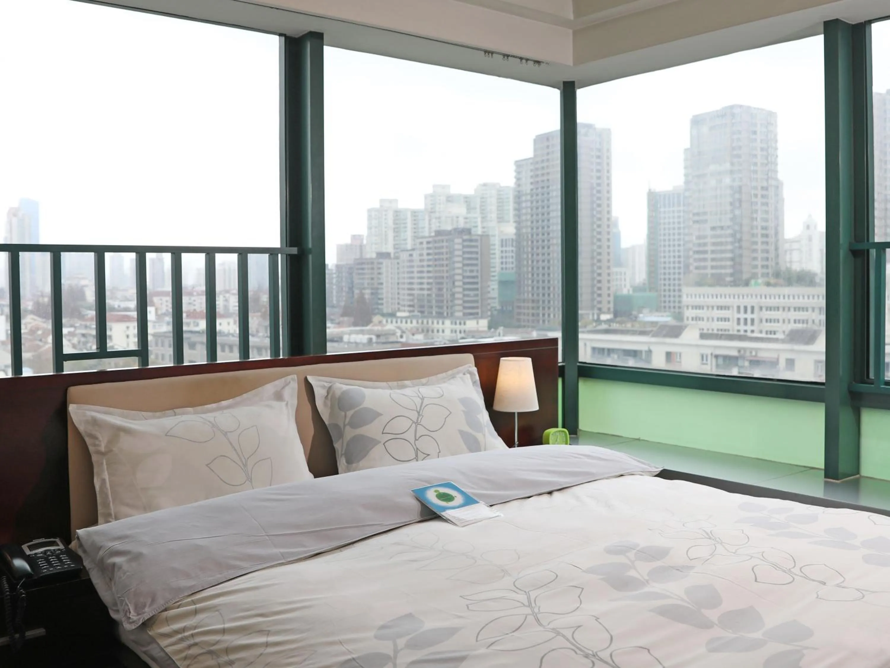 Bed in Shanghai Cosmo World Union Service Apartment