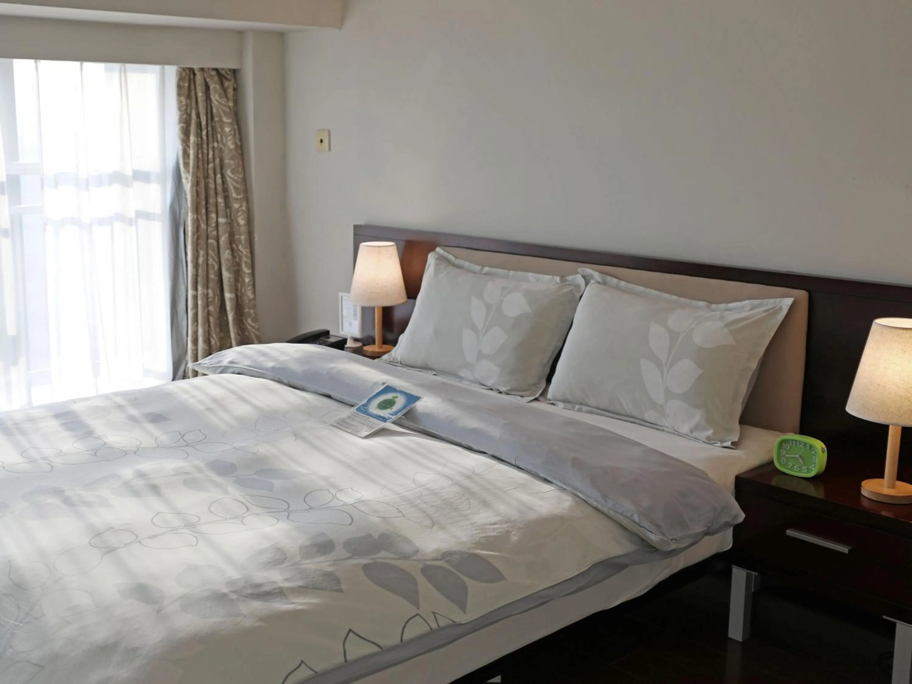 Bed in Shanghai Cosmo World Union Service Apartment