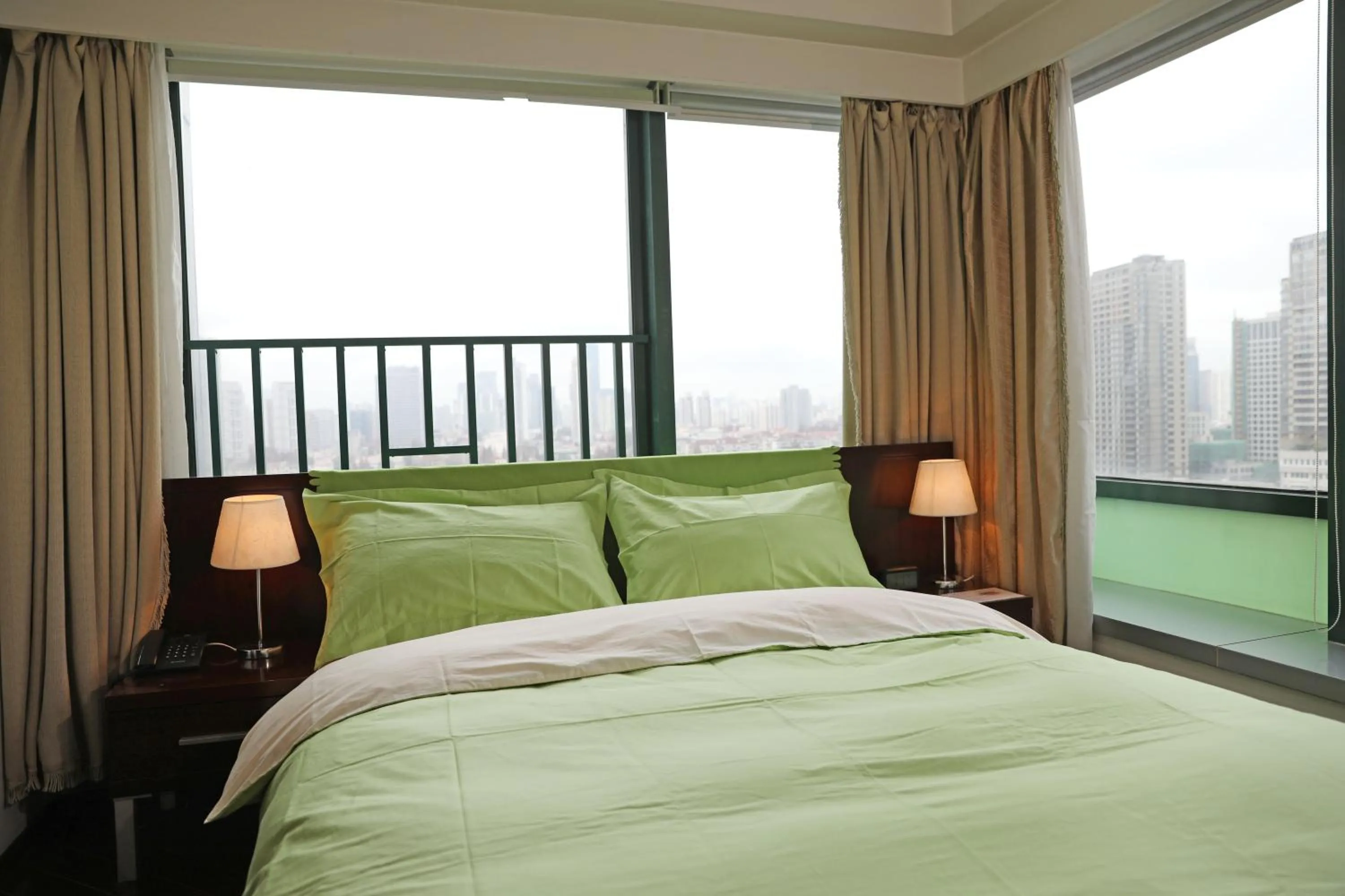 Bed in Shanghai Cosmo World Union Service Apartment