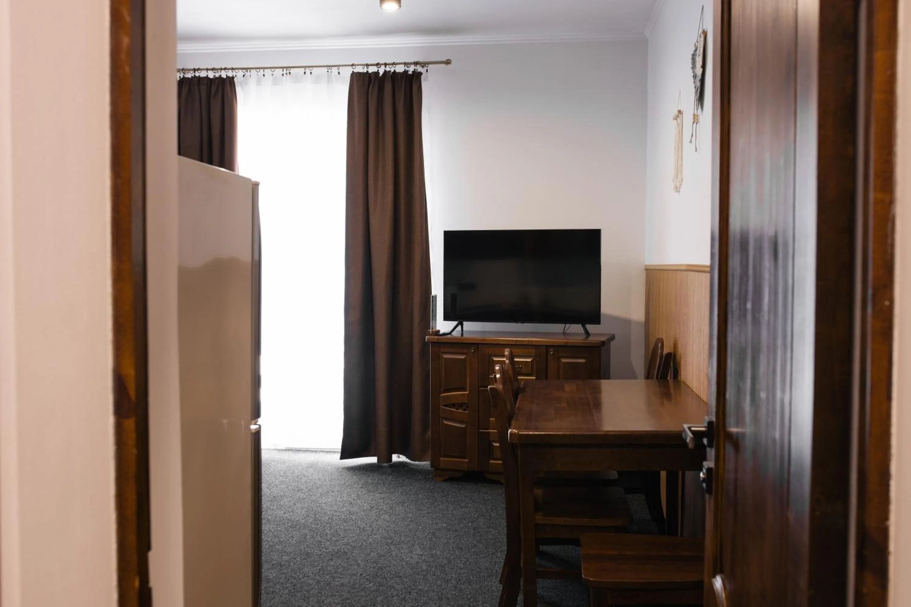 Communal lounge/ TV room in ZimaSnow Ski & Spa Club