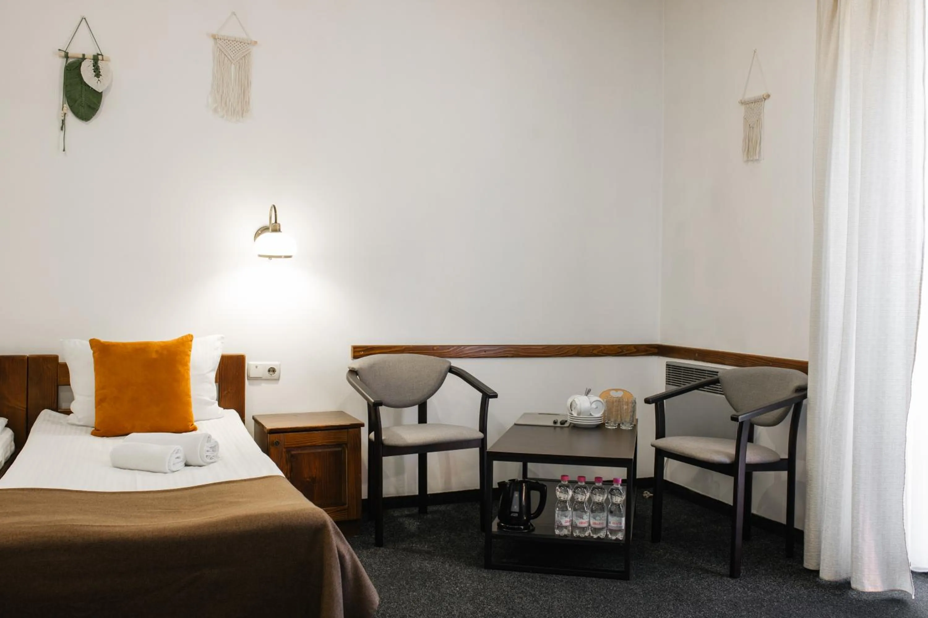 Seating area, Bed in ZimaSnow Ski & Spa Club