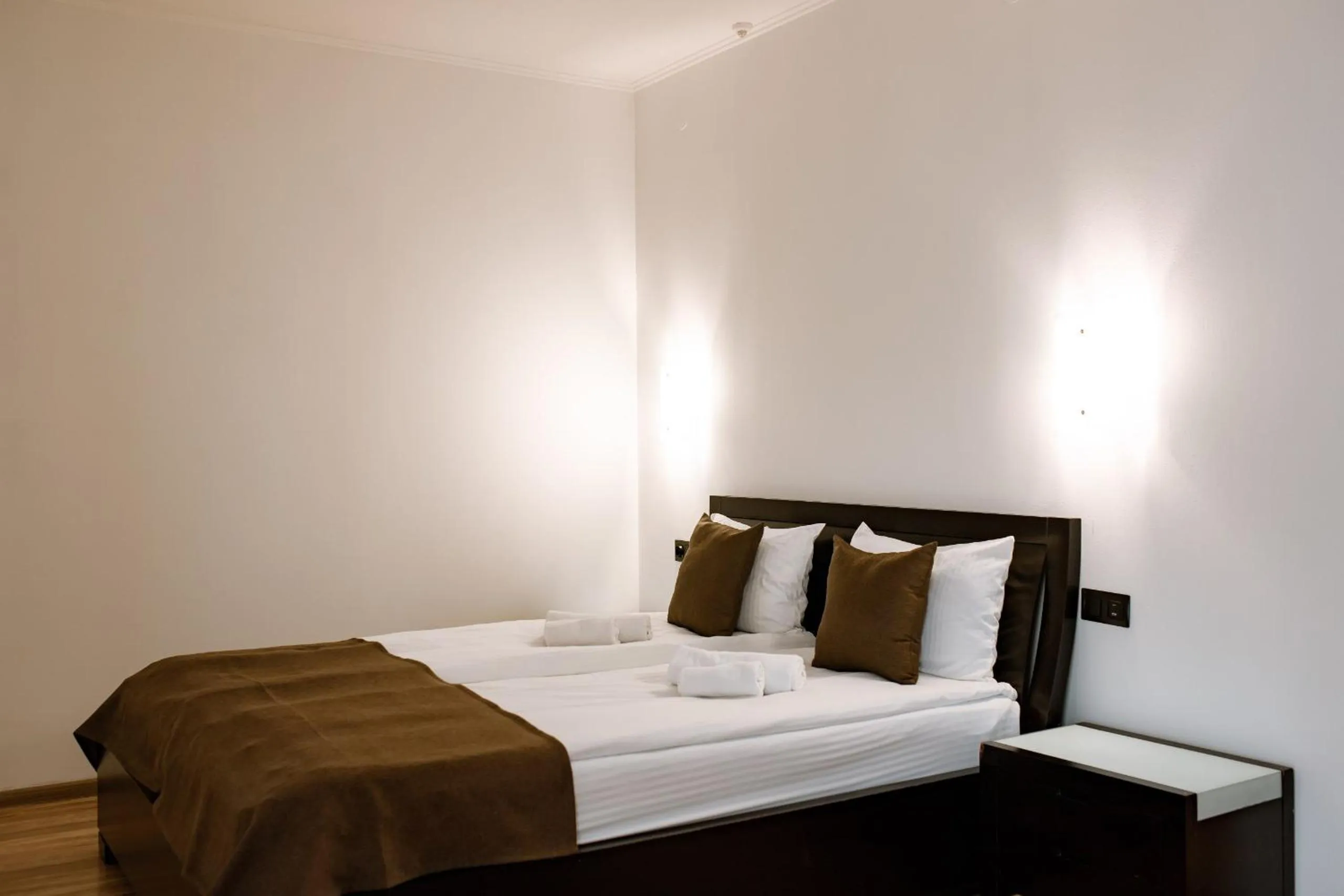 Bed in ZimaSnow Ski & Spa Club