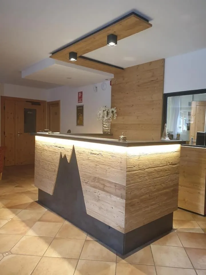 Lobby or reception in Alp Hotel Dolomiti