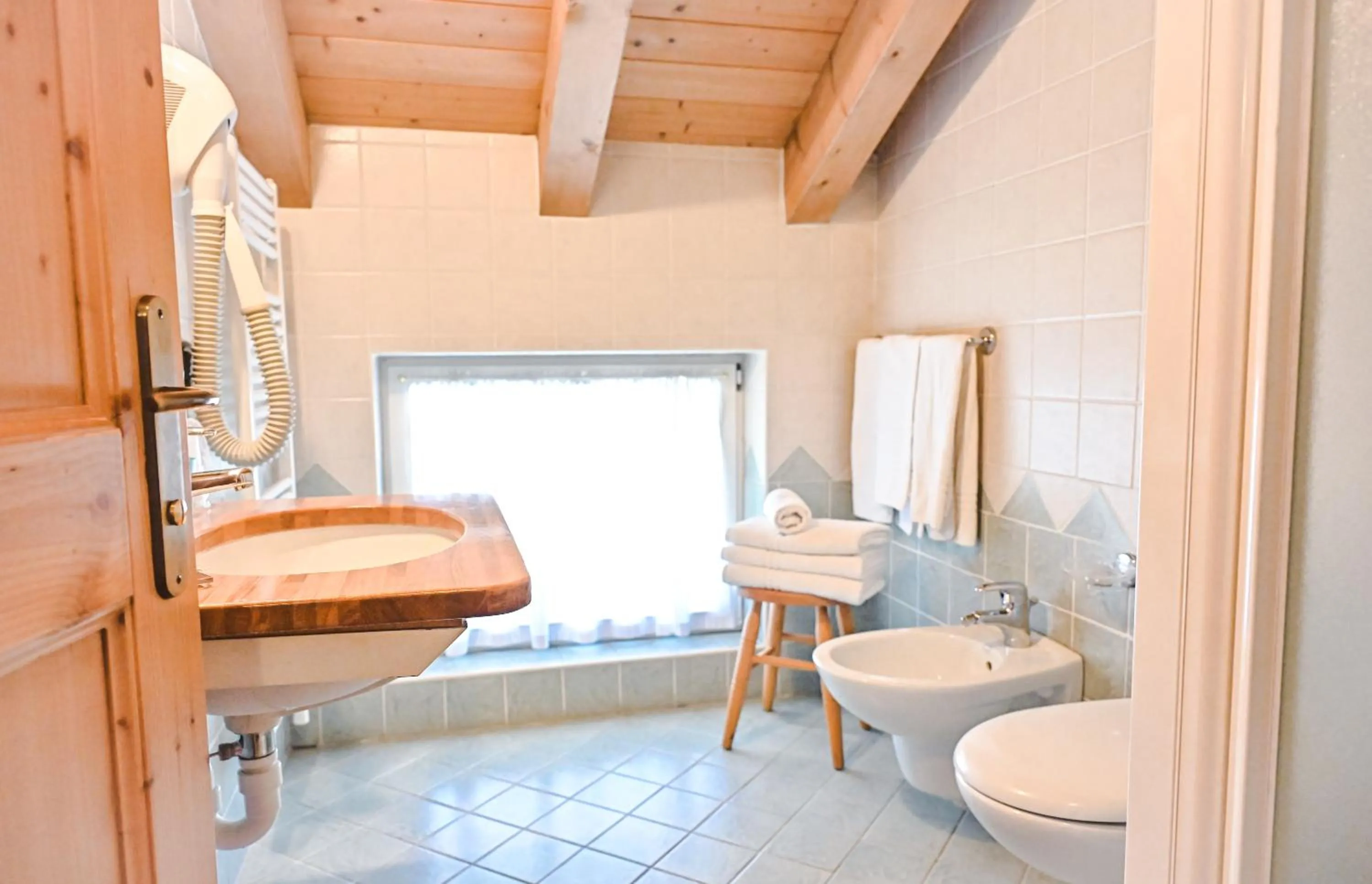 Bathroom in Alp Hotel Dolomiti