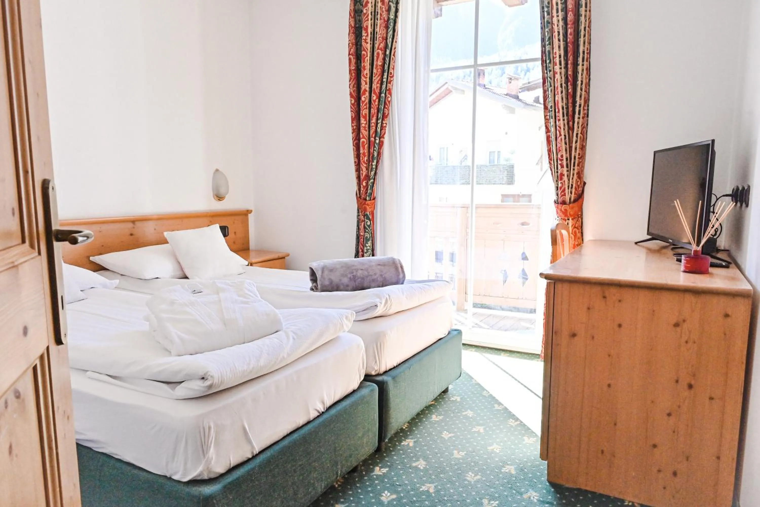 Bed in Alp Hotel Dolomiti