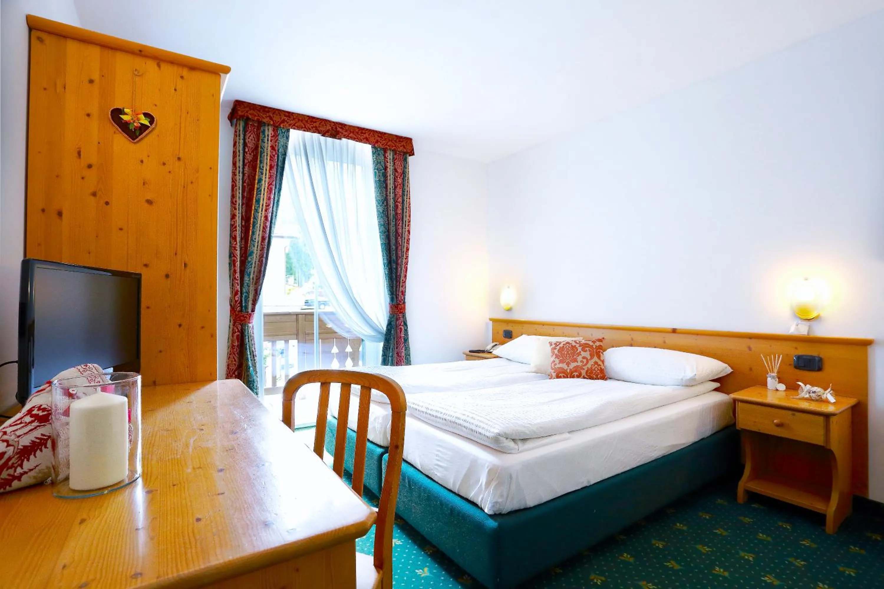 Bed in Alp Hotel Dolomiti