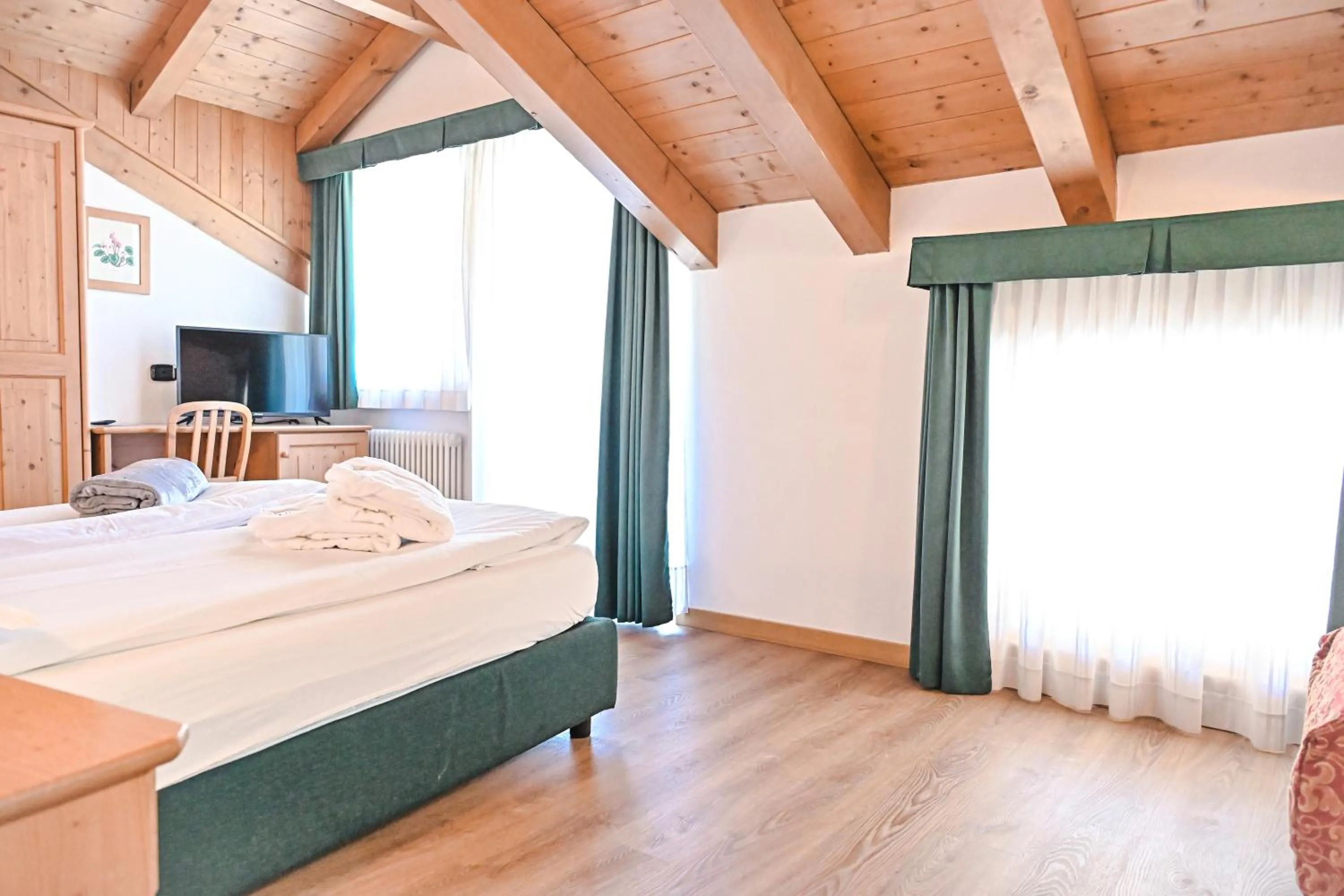 Bed in Alp Hotel Dolomiti