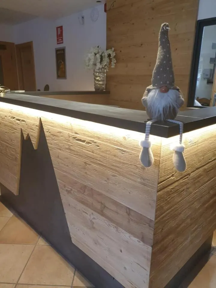 Lobby or reception in Alp Hotel Dolomiti