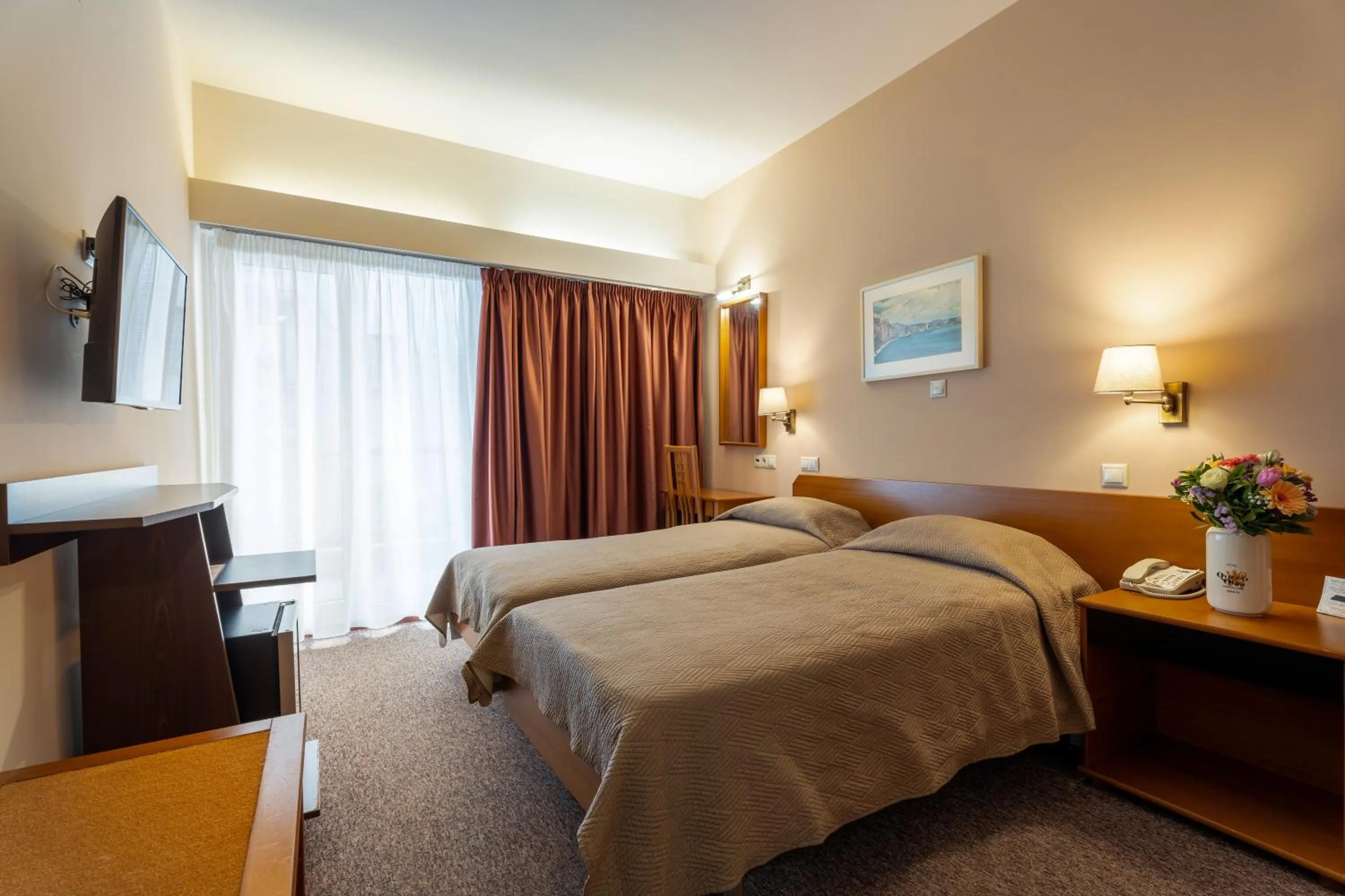 Bed in Queen Olga Hotel