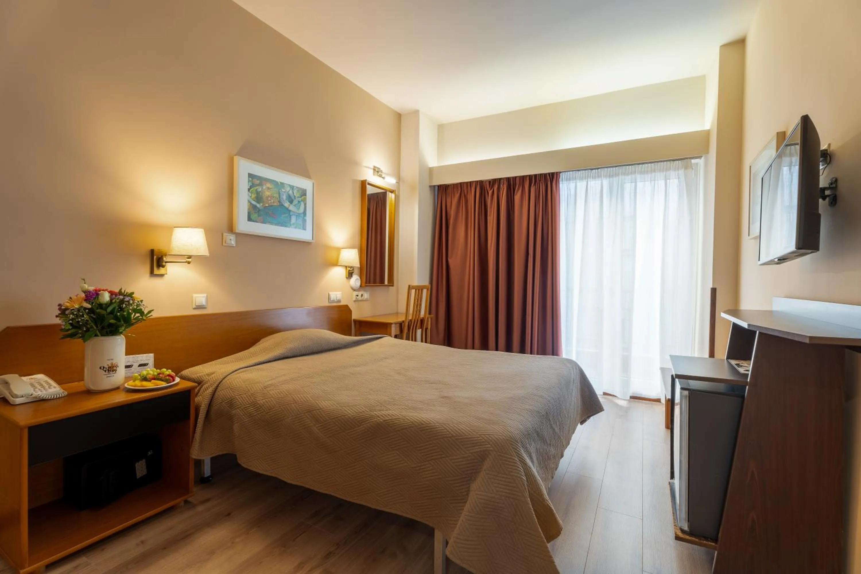 Bed in Queen Olga Hotel