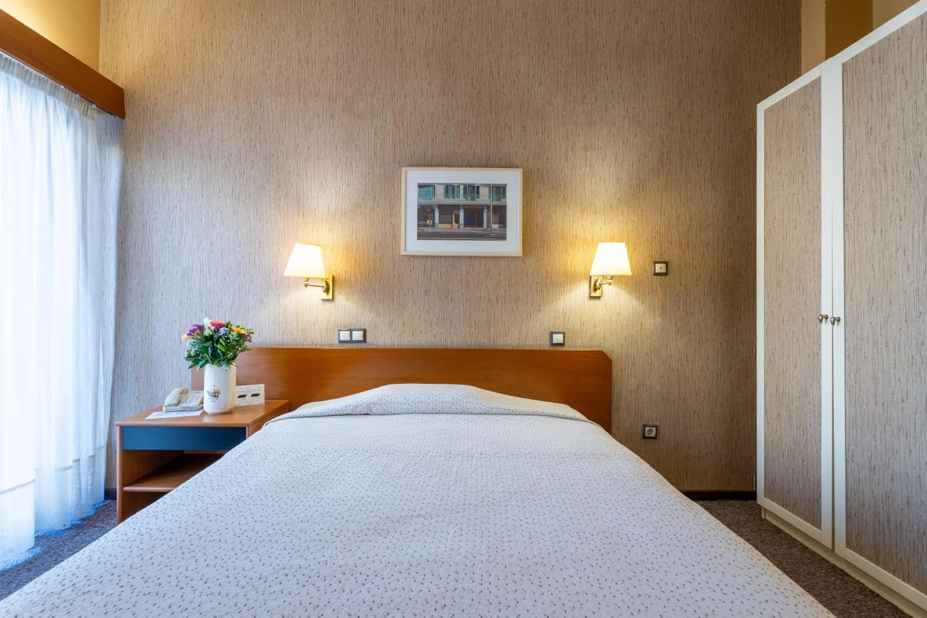 Bed in Queen Olga Hotel