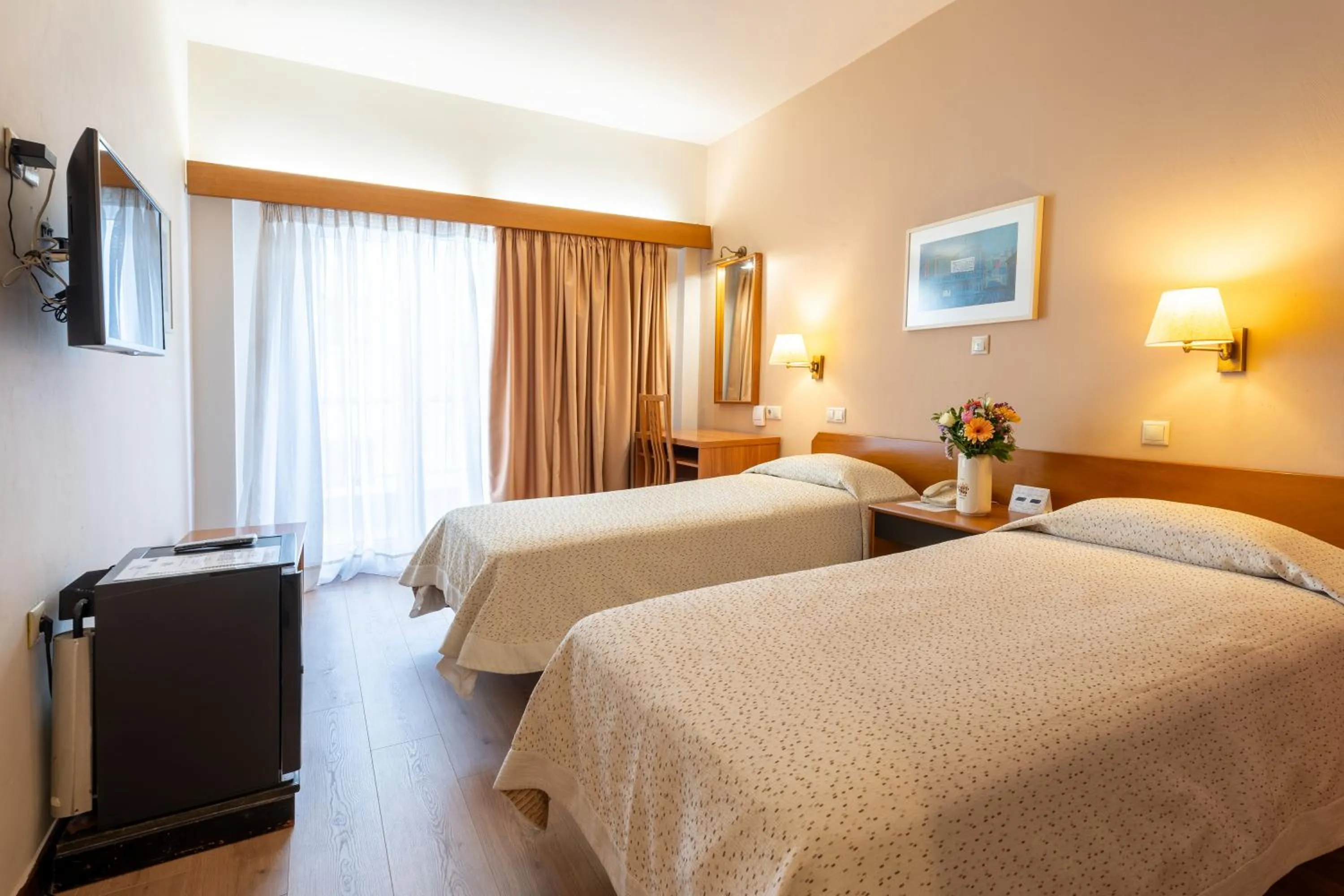 Bed in Queen Olga Hotel