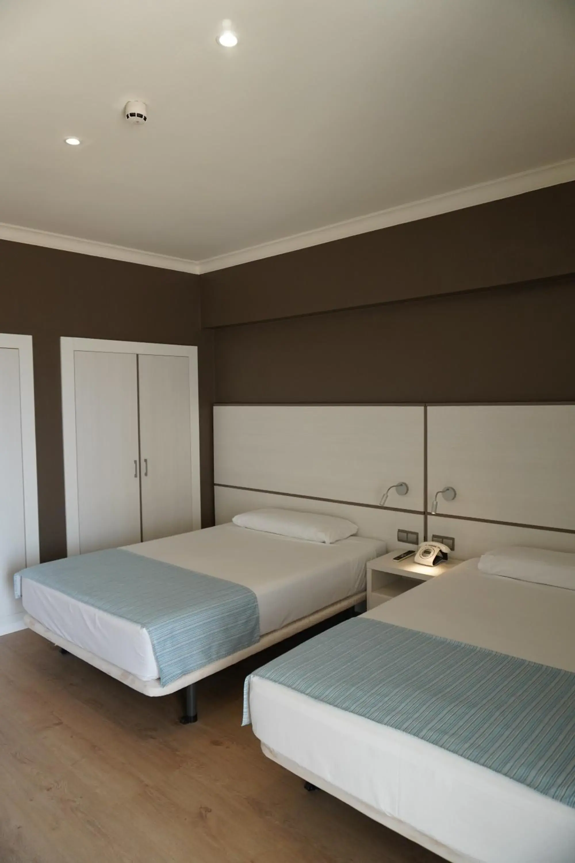 Bed in Hotel Brisamar Suites Bed in Hotel Brisamar Suites