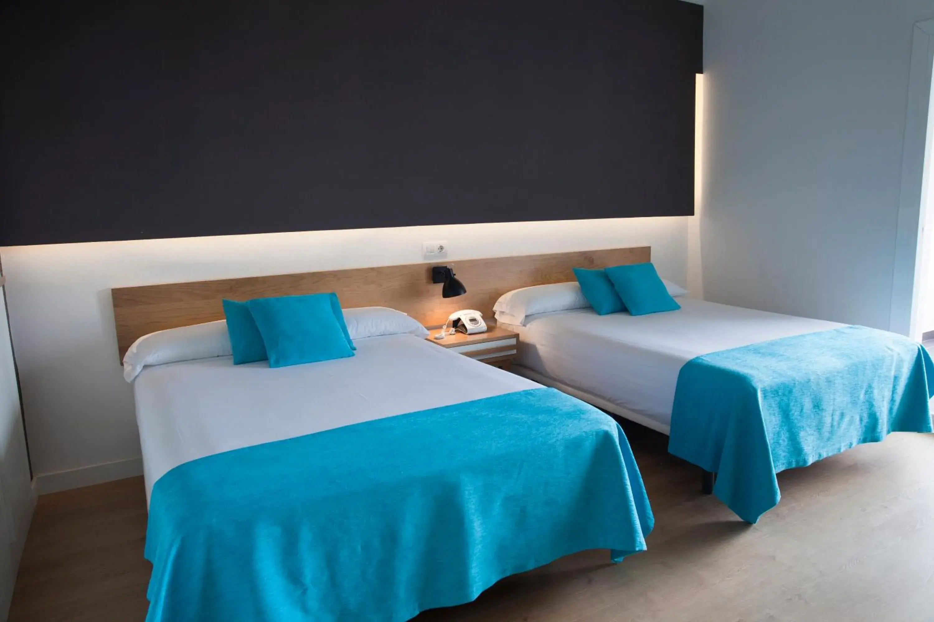 Bed in Hotel Brisamar Suites Bed in Hotel Brisamar Suites