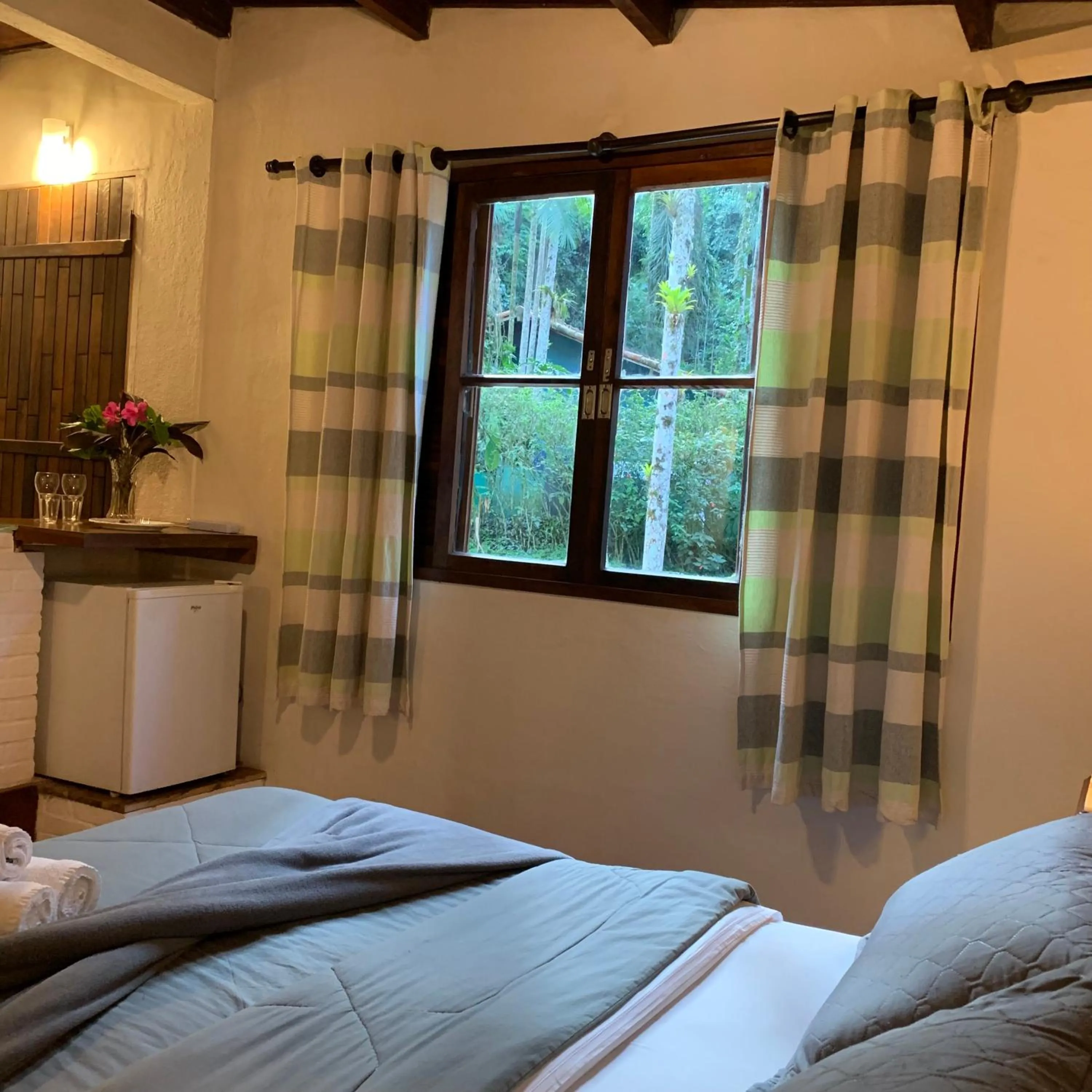 Photo of the whole room, Bed in Pousada Sítio Itaúna