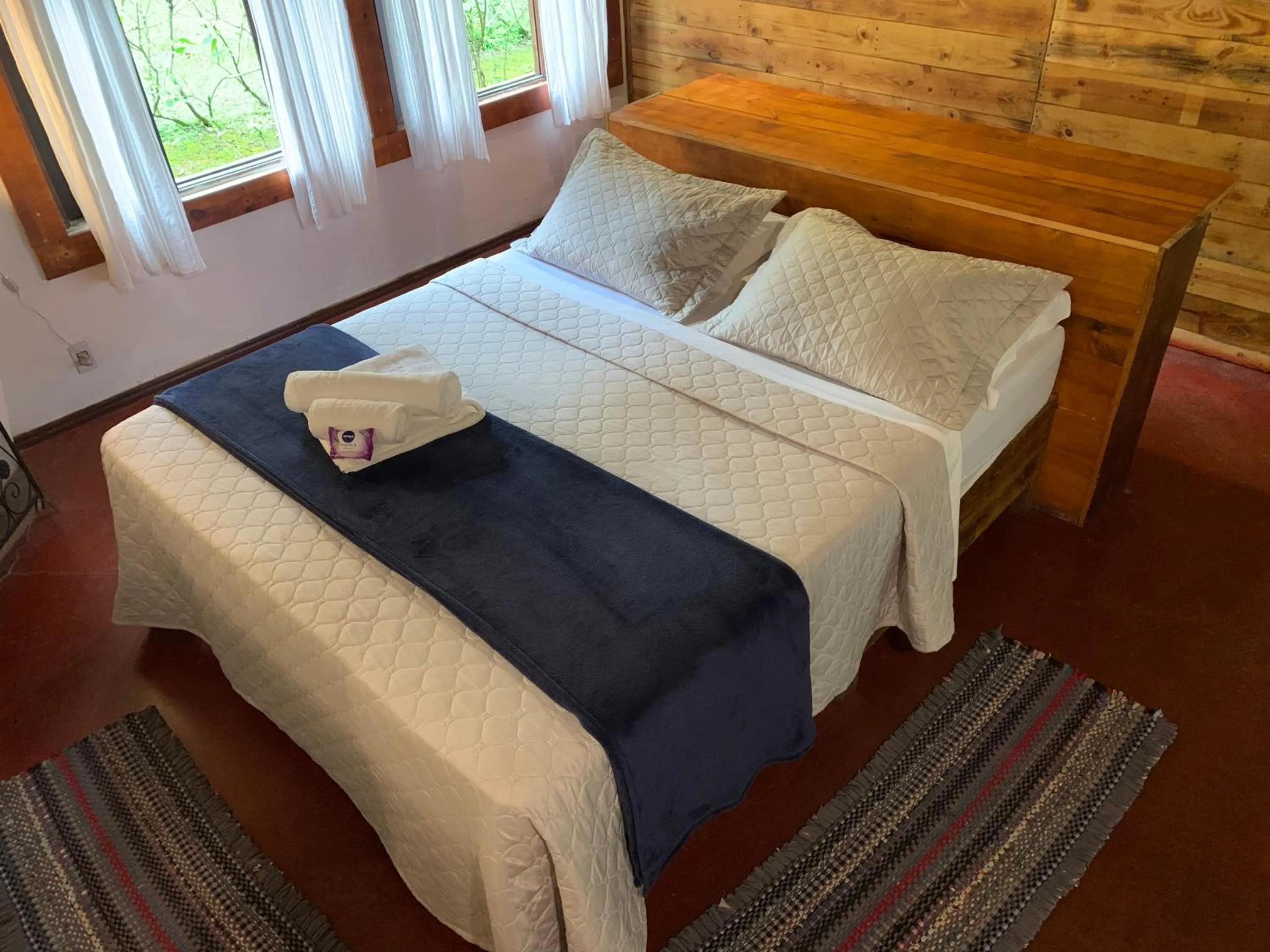 Bed in Pousada Sítio Itaúna