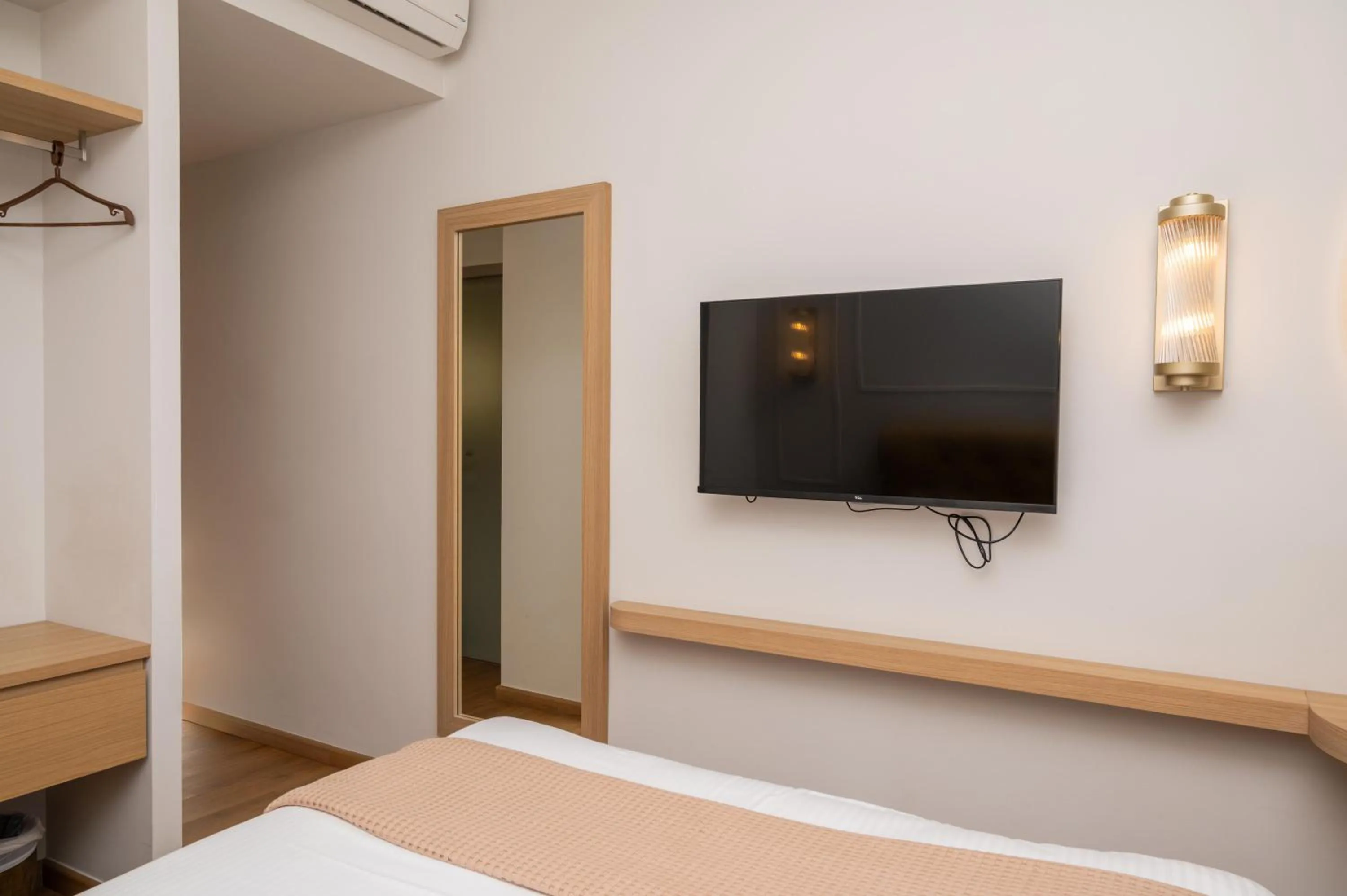 Bed in Aktaion City Hotel