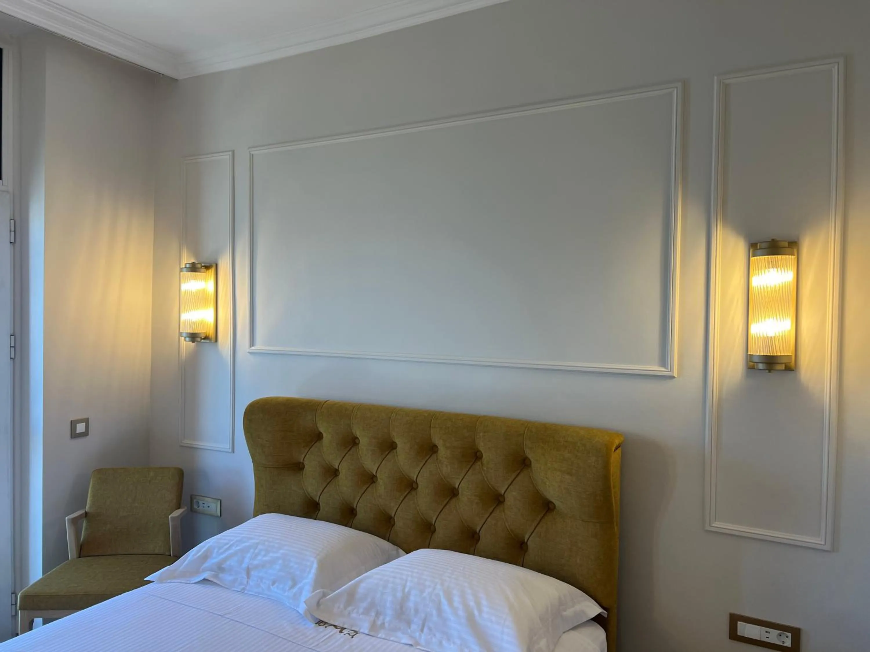 Bed in Aktaion City Hotel