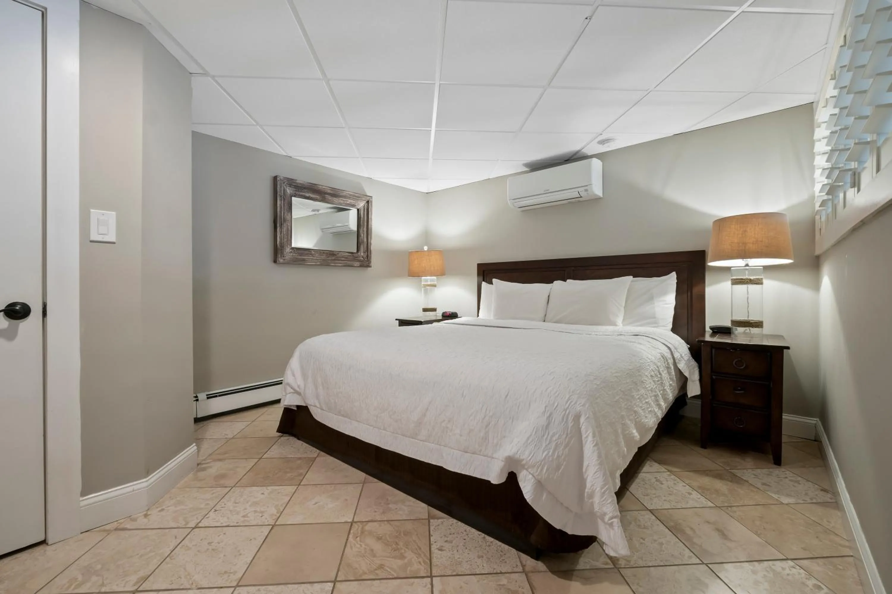 Bed in Sea Rose Suites