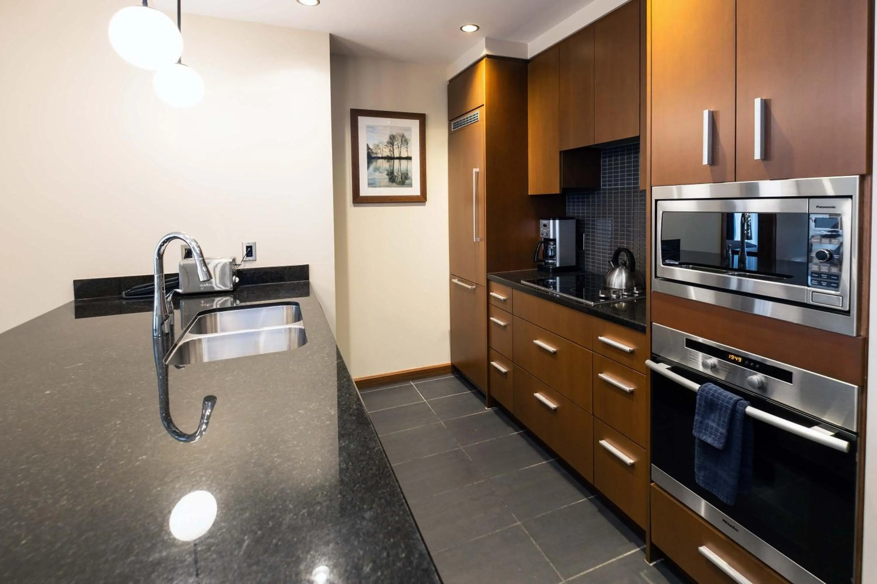 Kitchen or kitchenette in Sutton Place Hotel Revelstoke Mountain Resort