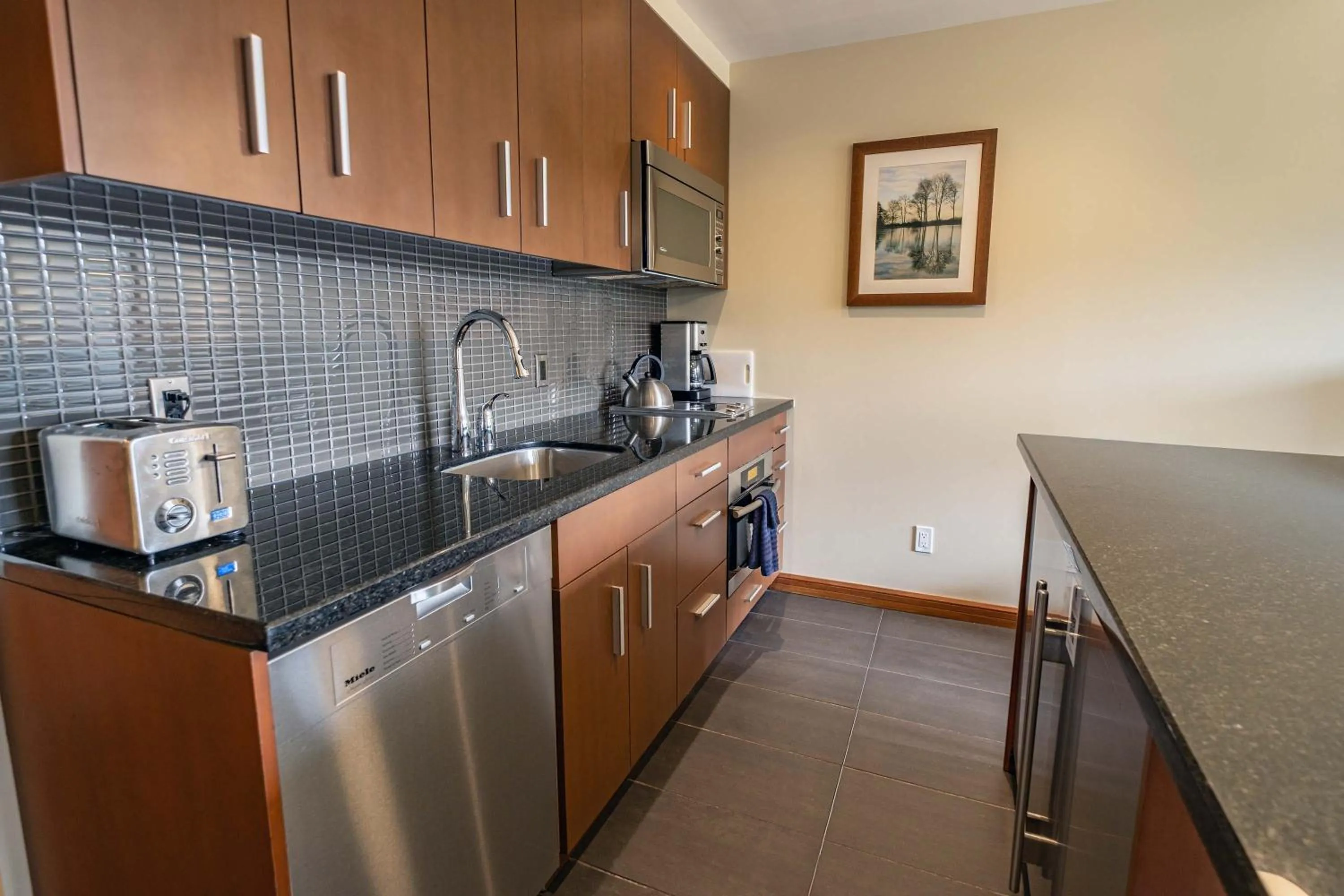 Kitchen or kitchenette in Sutton Place Hotel Revelstoke Mountain Resort