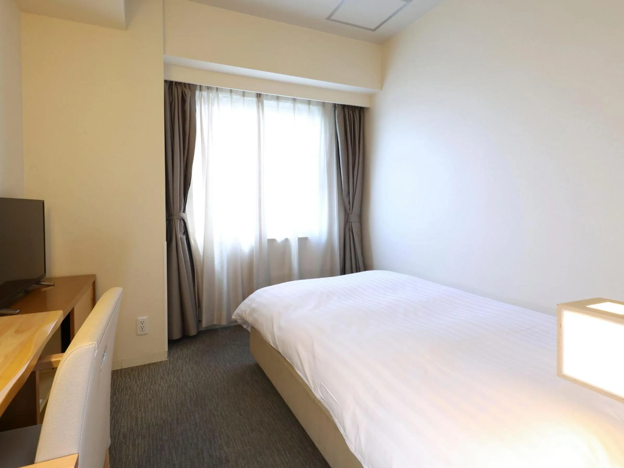 Bedroom, Bed in Dormy Inn Tsu