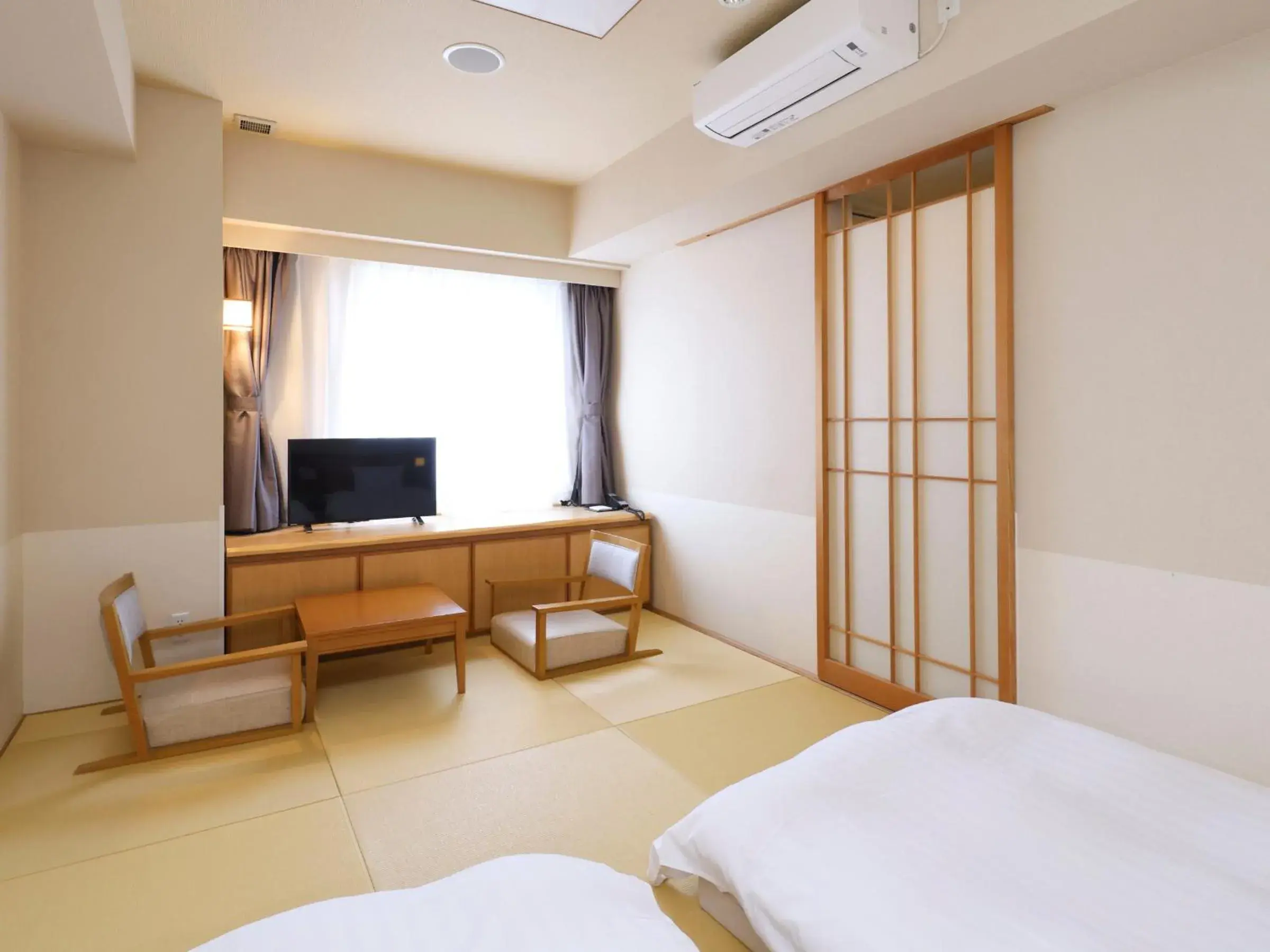 Bed in Dormy Inn Tsu Bed in Dormy Inn Tsu