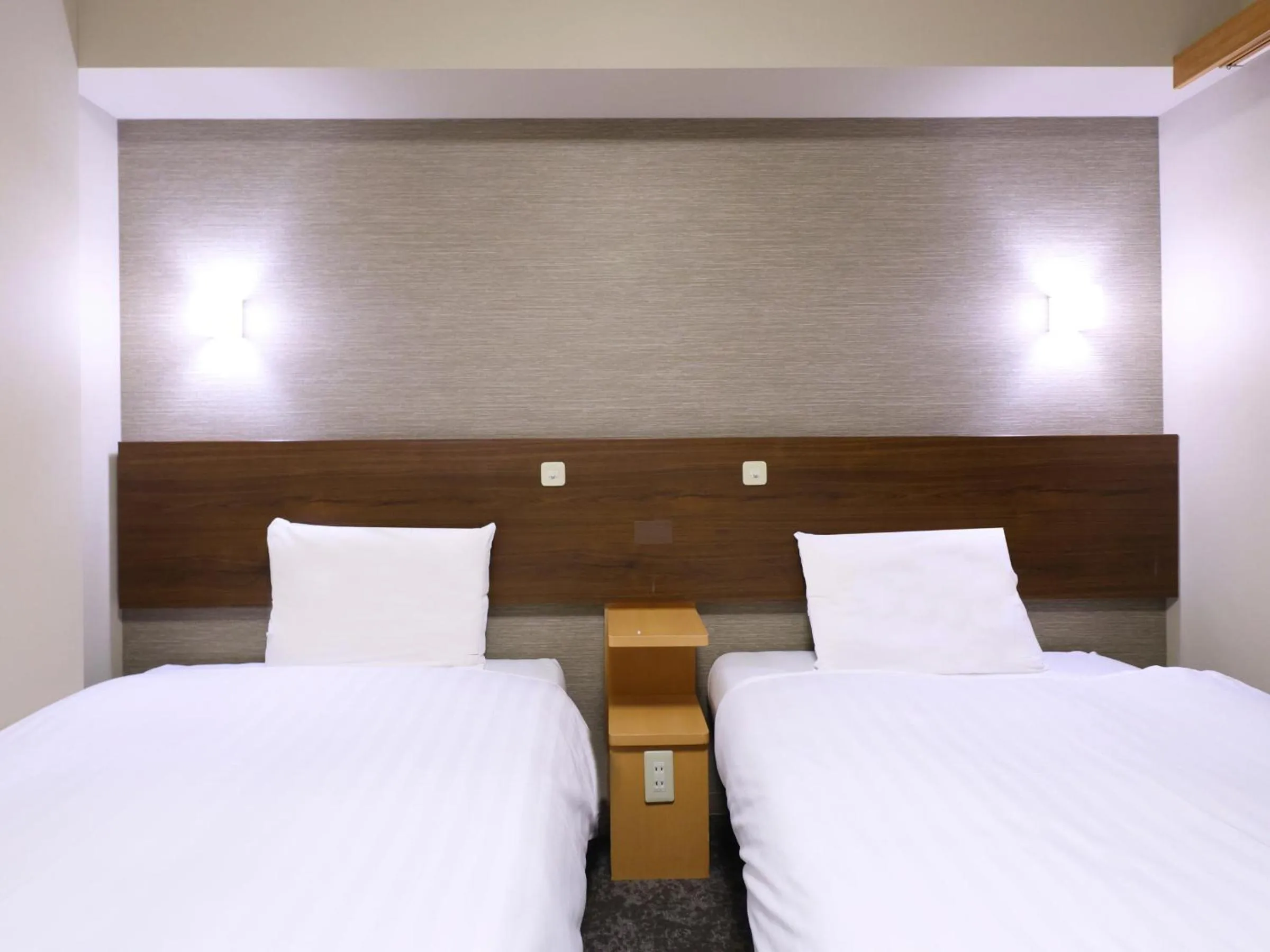 Photo of the whole room, Bed in Tennen Onsen Taho-no-Yu Dormy Inn Niigata