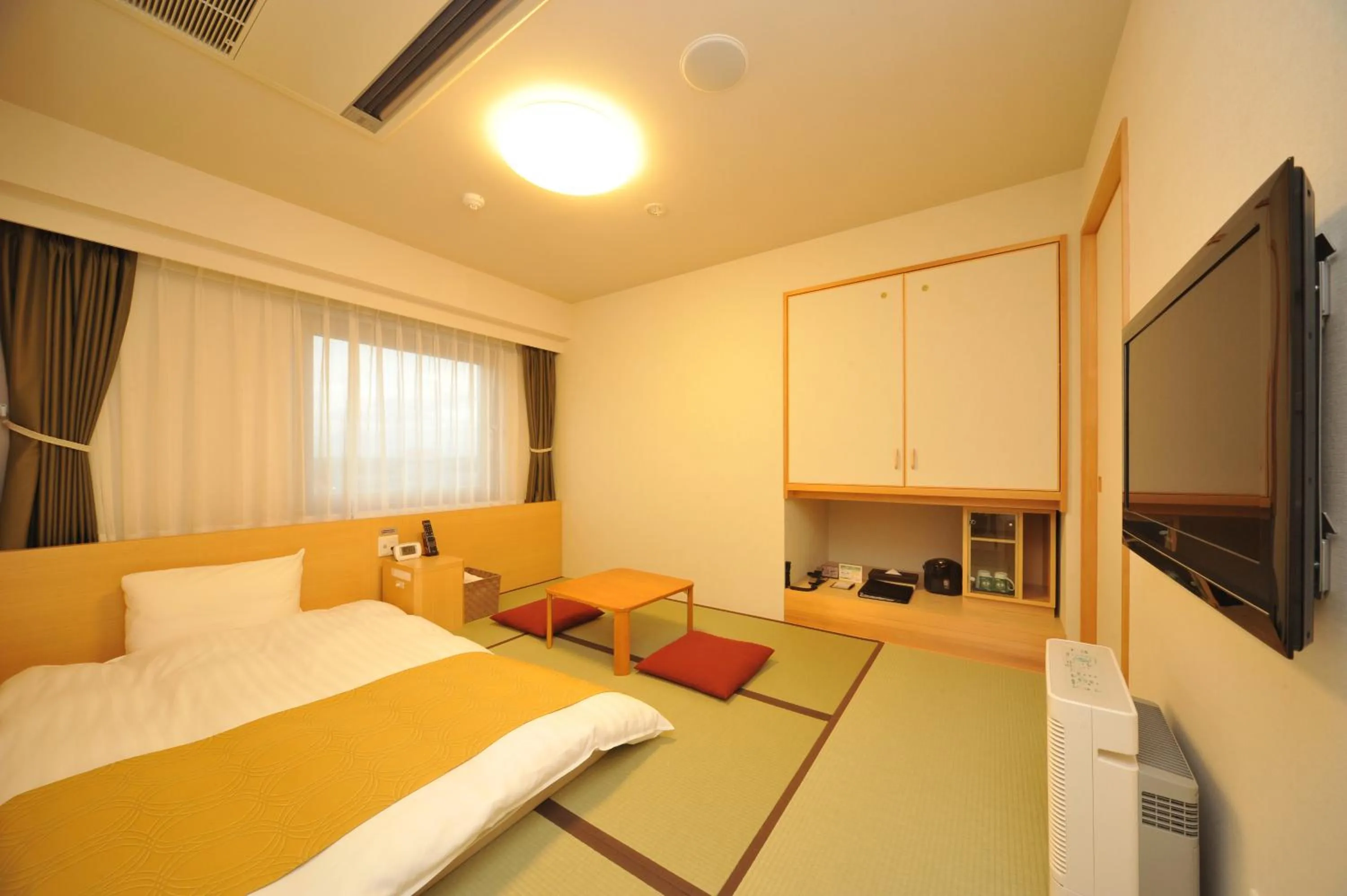 Living room, Bed in Dormy Inn Obihiro