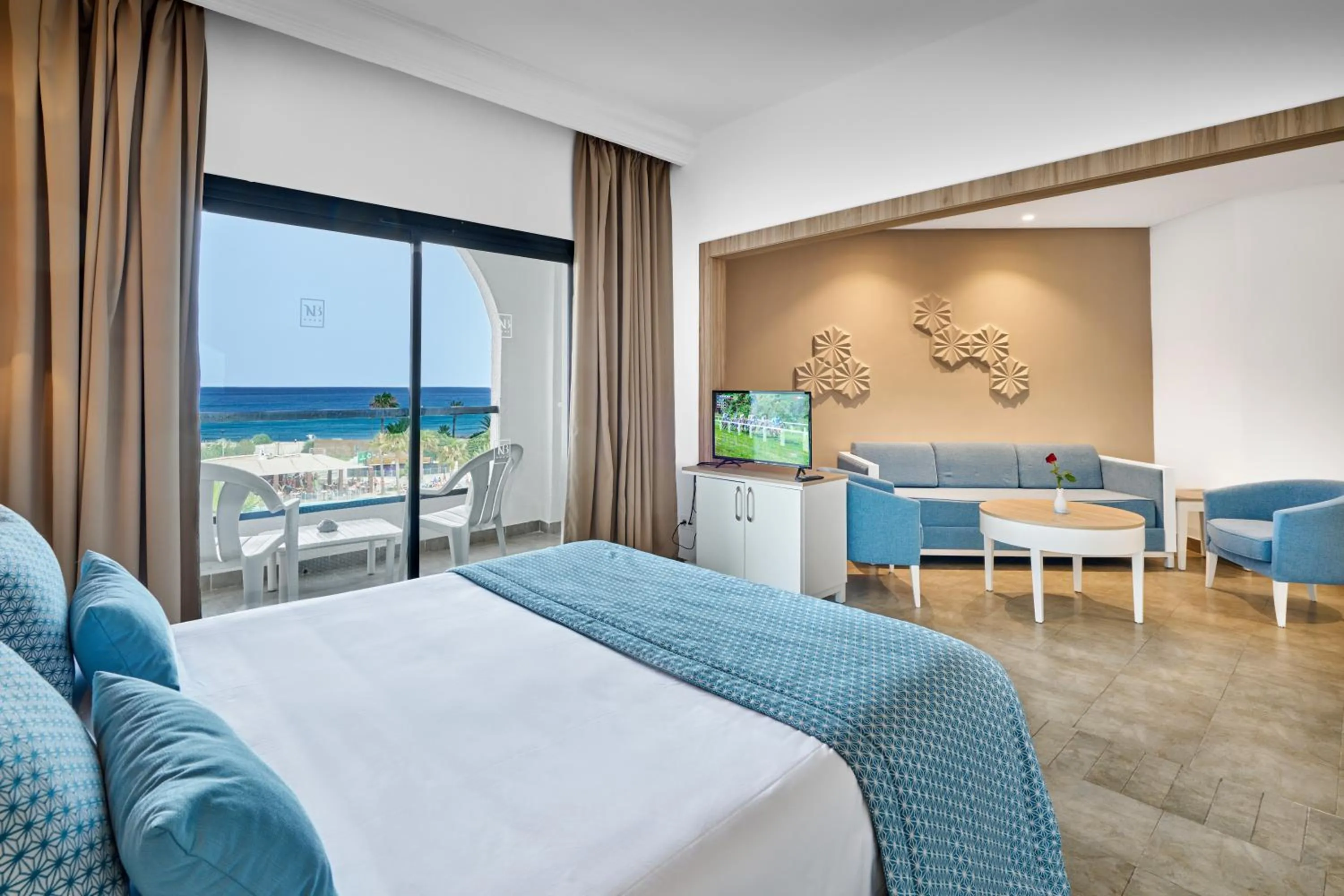 Living room, Bed in Nozha Beach Resort & Spa
