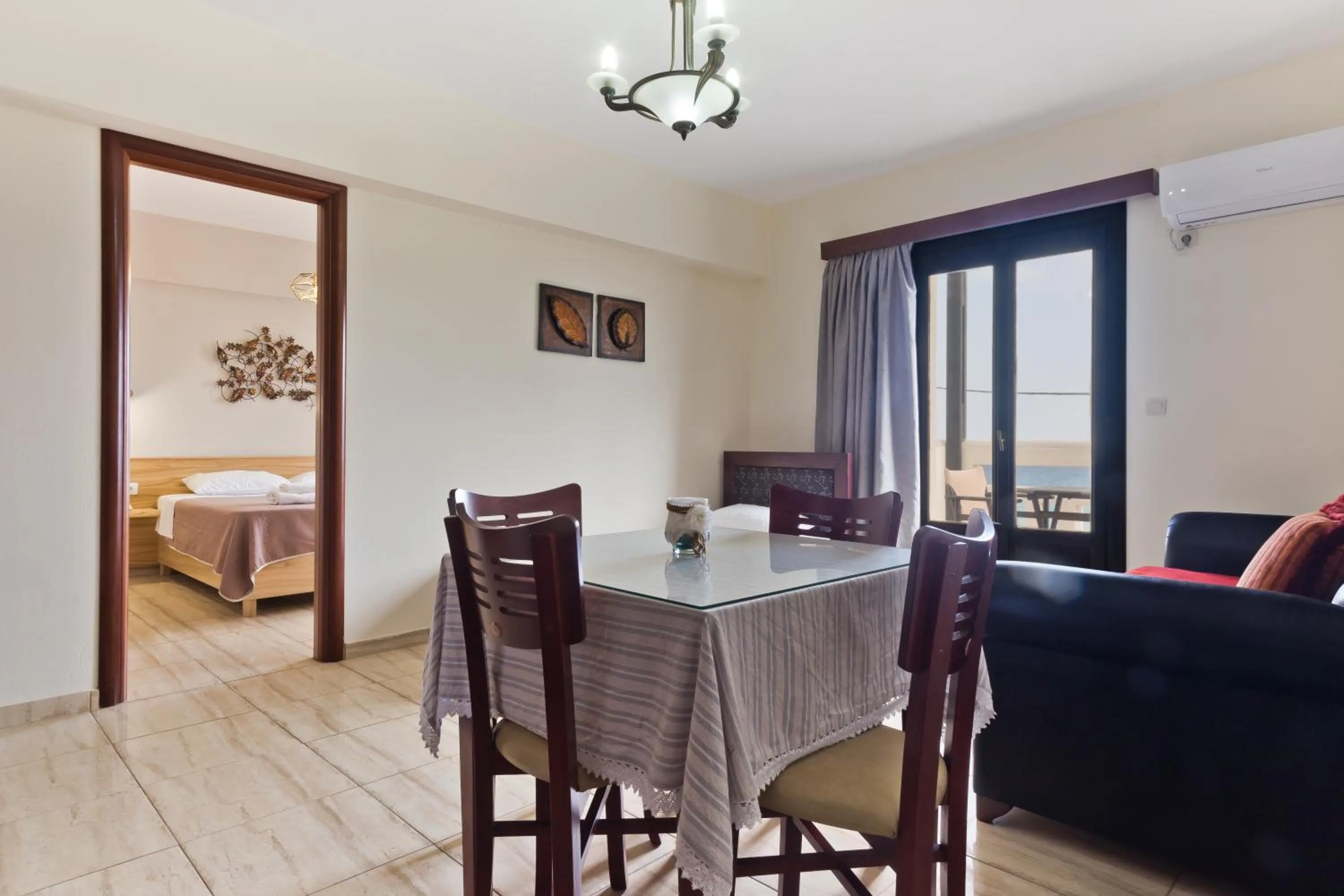 Seating area, Bed in Arkasa Bay Hotel