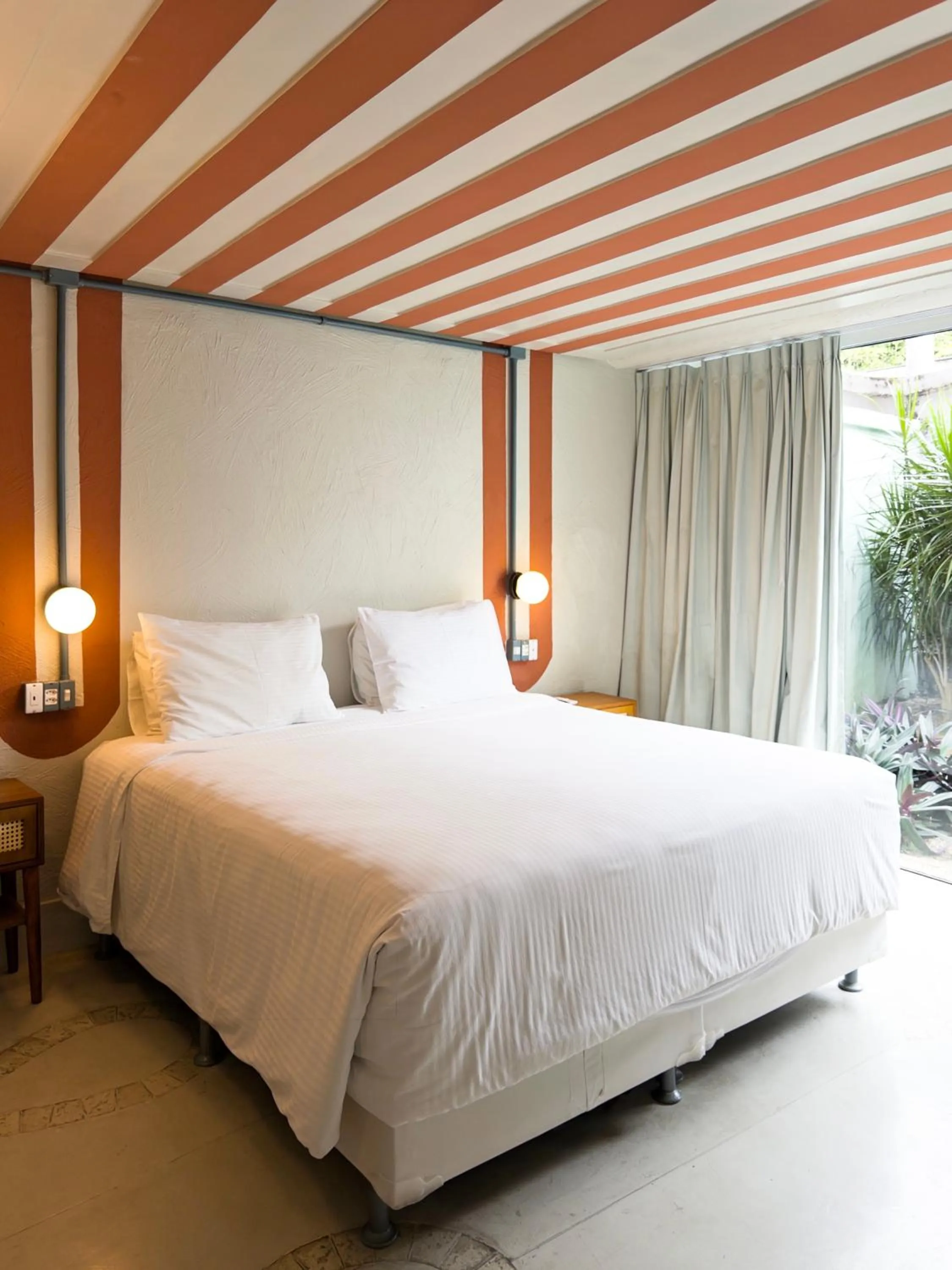 Bed in Own Búzios Beach Hotel