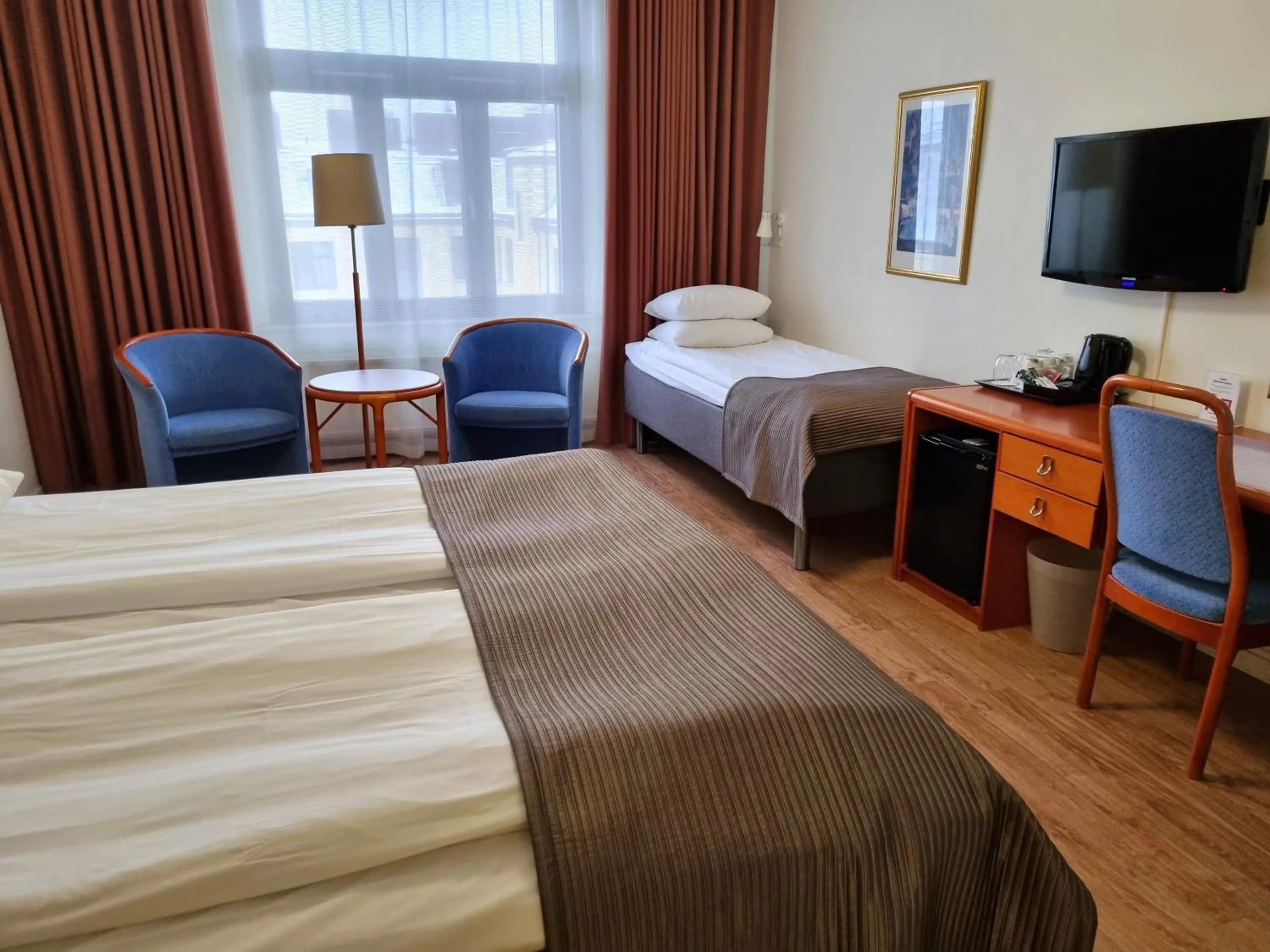 Seating area, Bed in Hotel Lorensberg