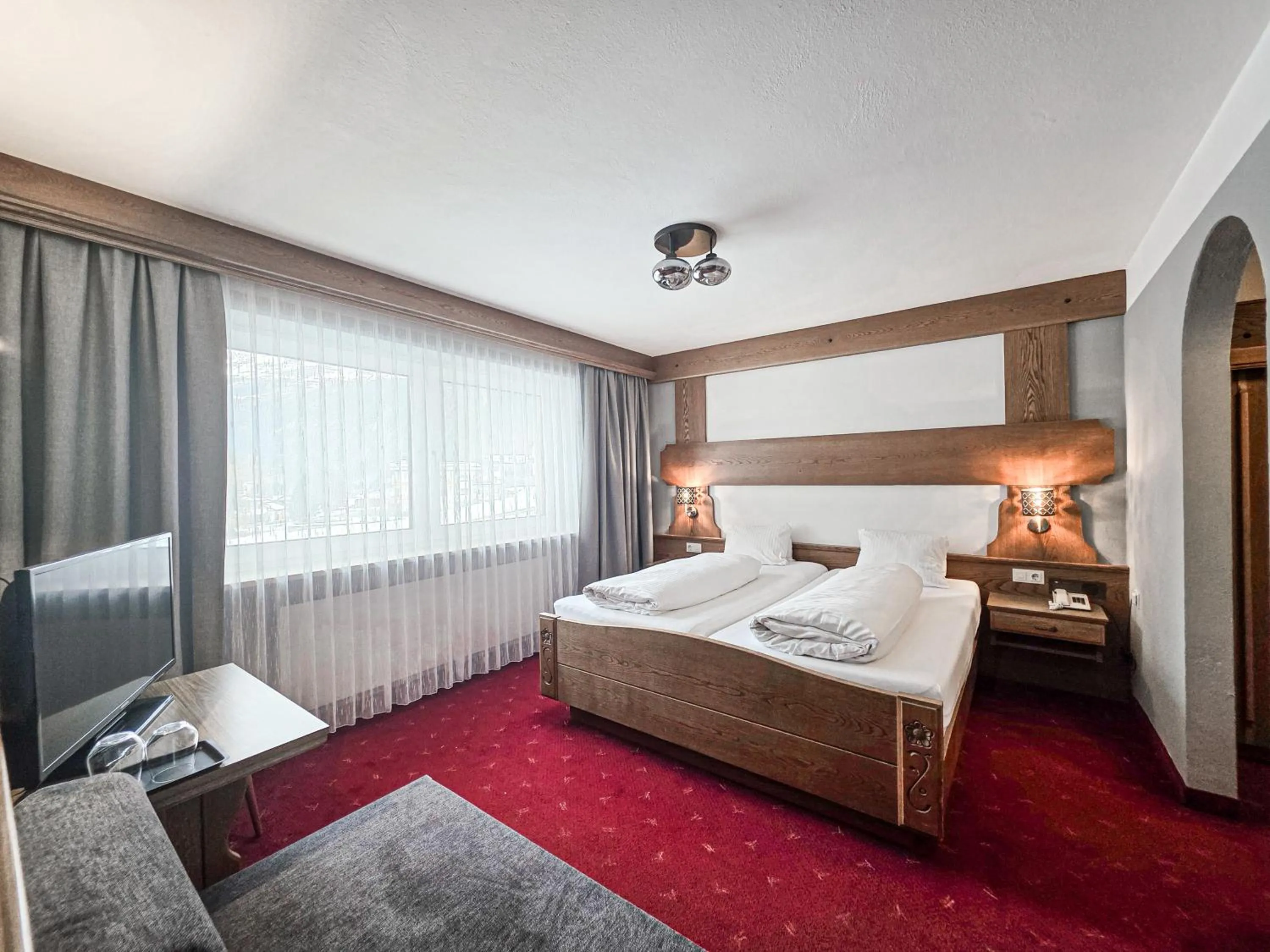 Photo of the whole room, Bed in Hotel Lärchenhof