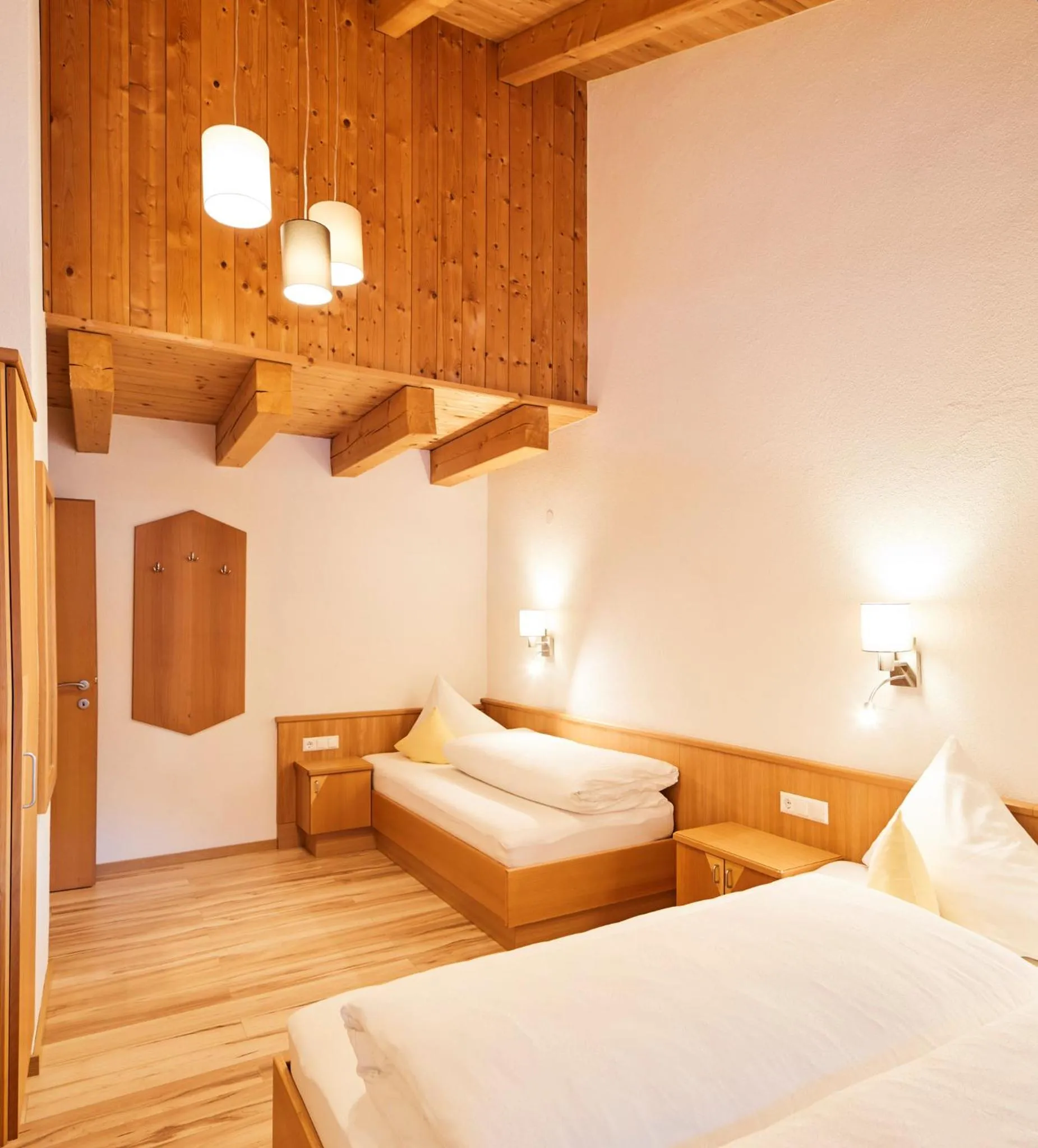 Bedroom, Bed in Tirolerhof - Appartementhaus