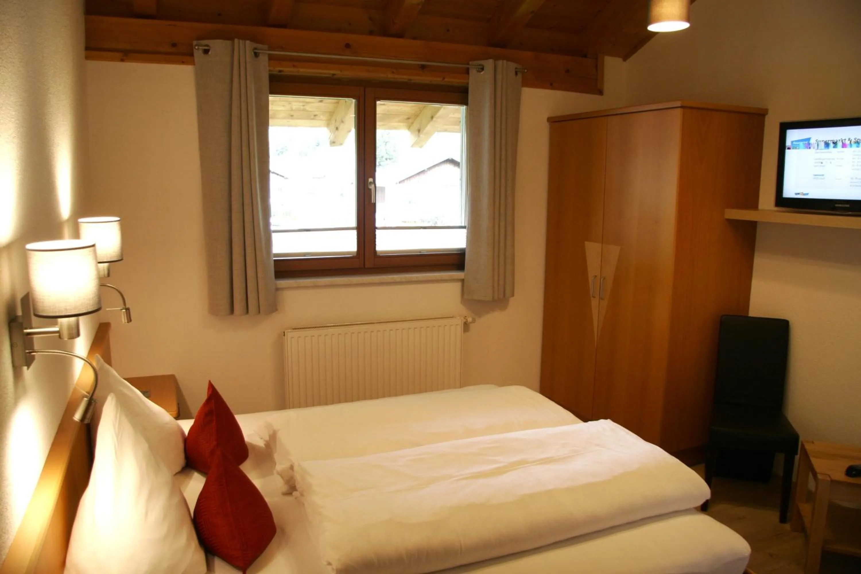 Bedroom, Bed in Tirolerhof - Appartementhaus