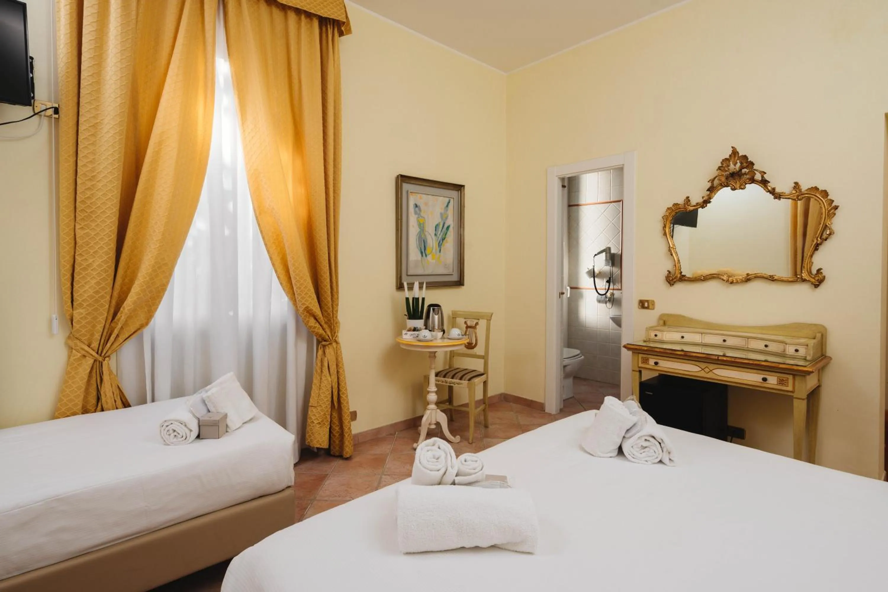 Bed in Sourire Hotel