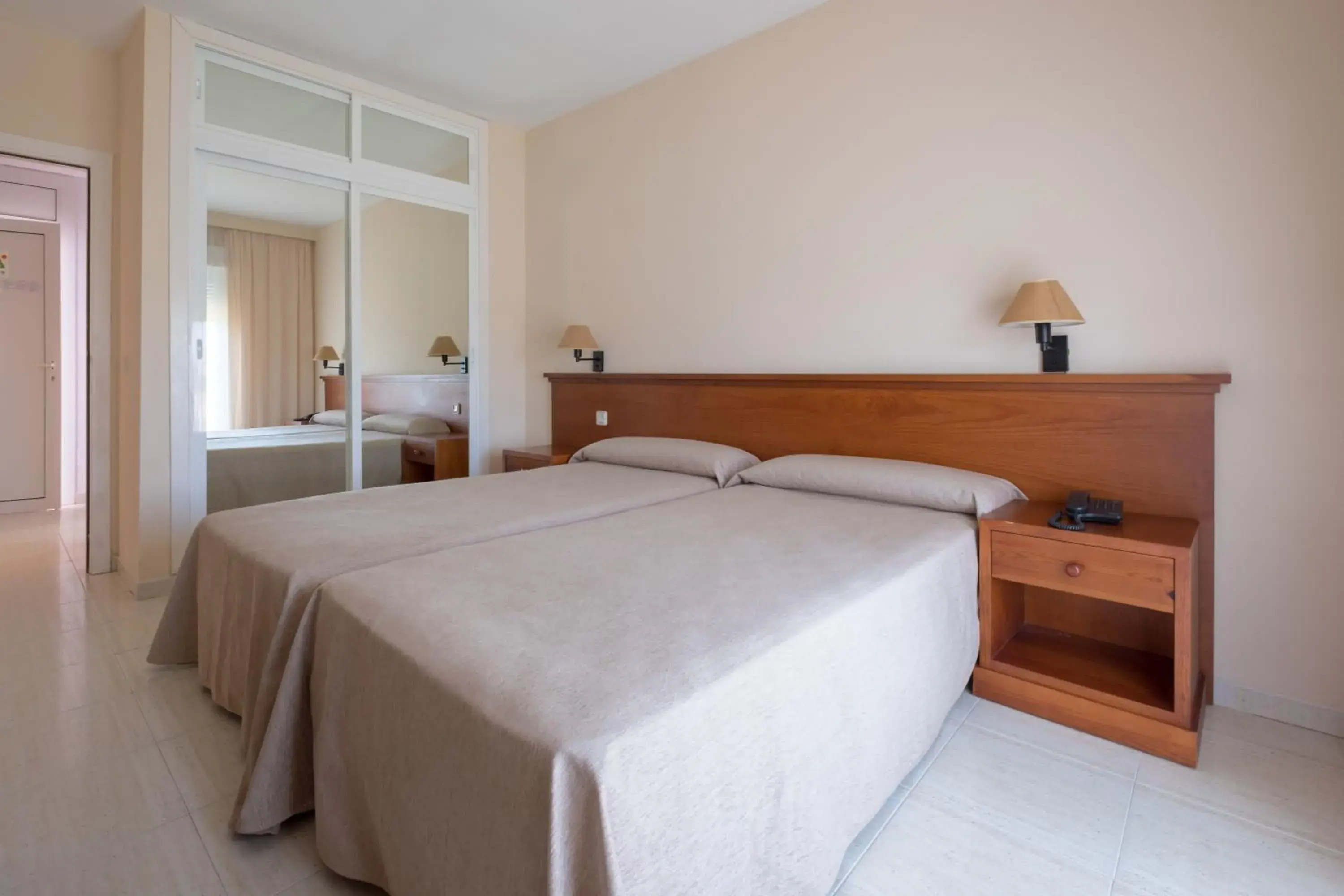 Bed in Aparthotel las Dunas Bed in Aparthotel las Dunas